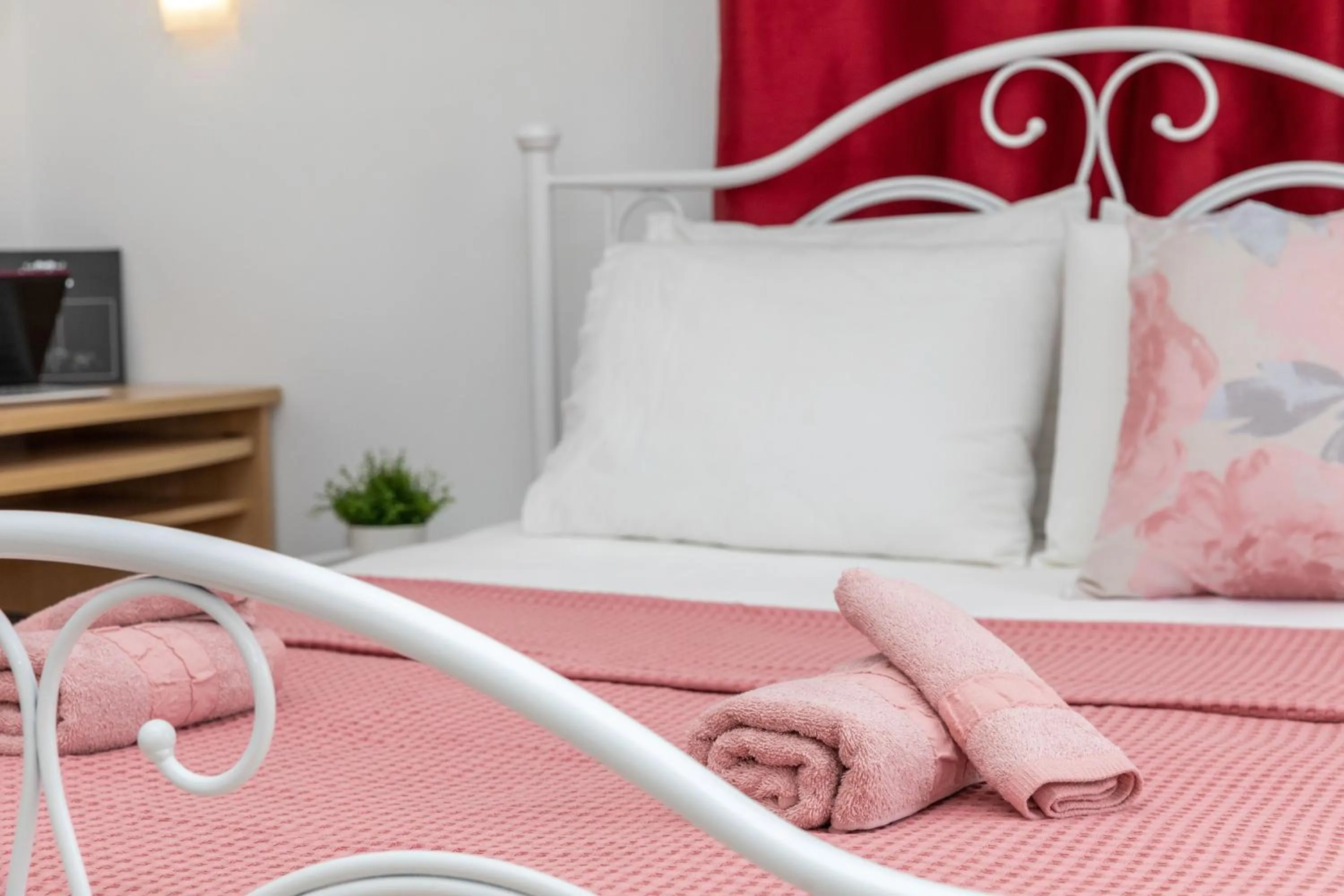 Bed in NAXOS DIAMOND Studios Apartments