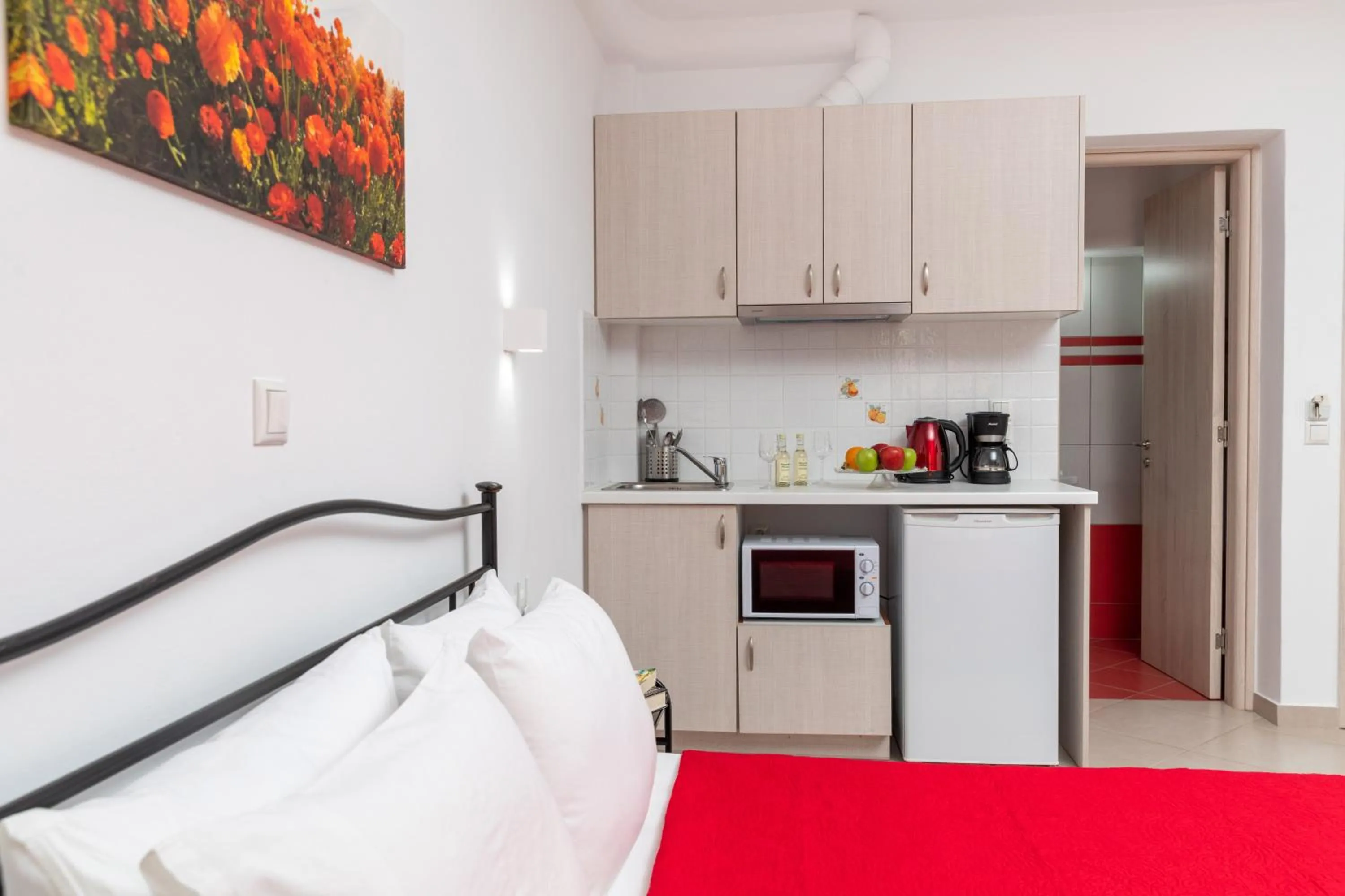 Bed in NAXOS DIAMOND Studios Apartments