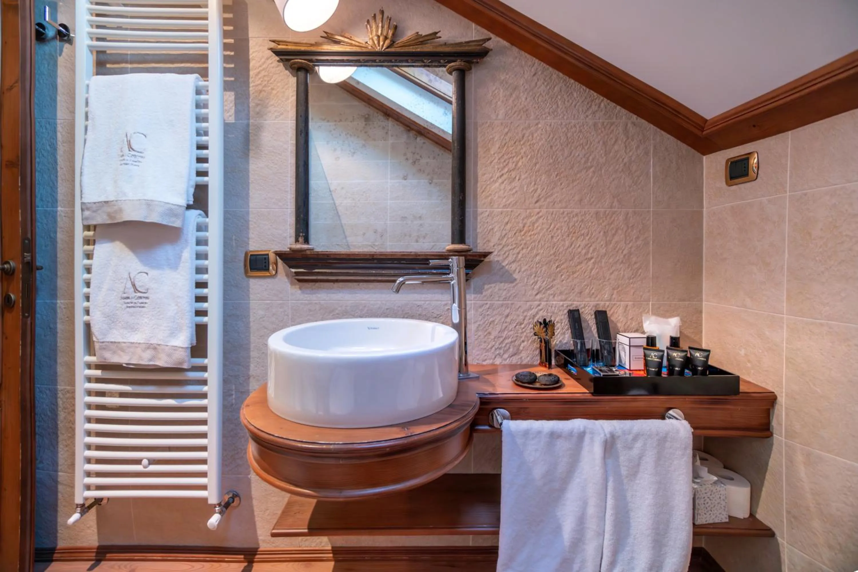 Bathroom in Ambra Cortina Luxury&Fashion Hotel