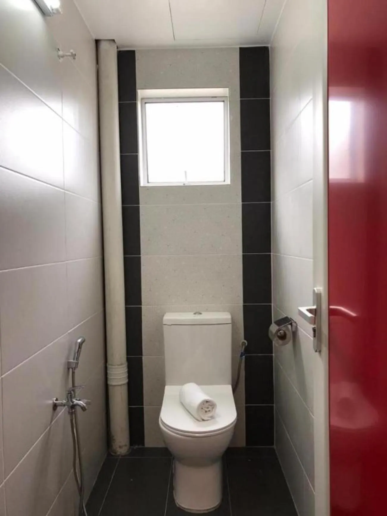 Toilet in TT Dorf Hotel Matang