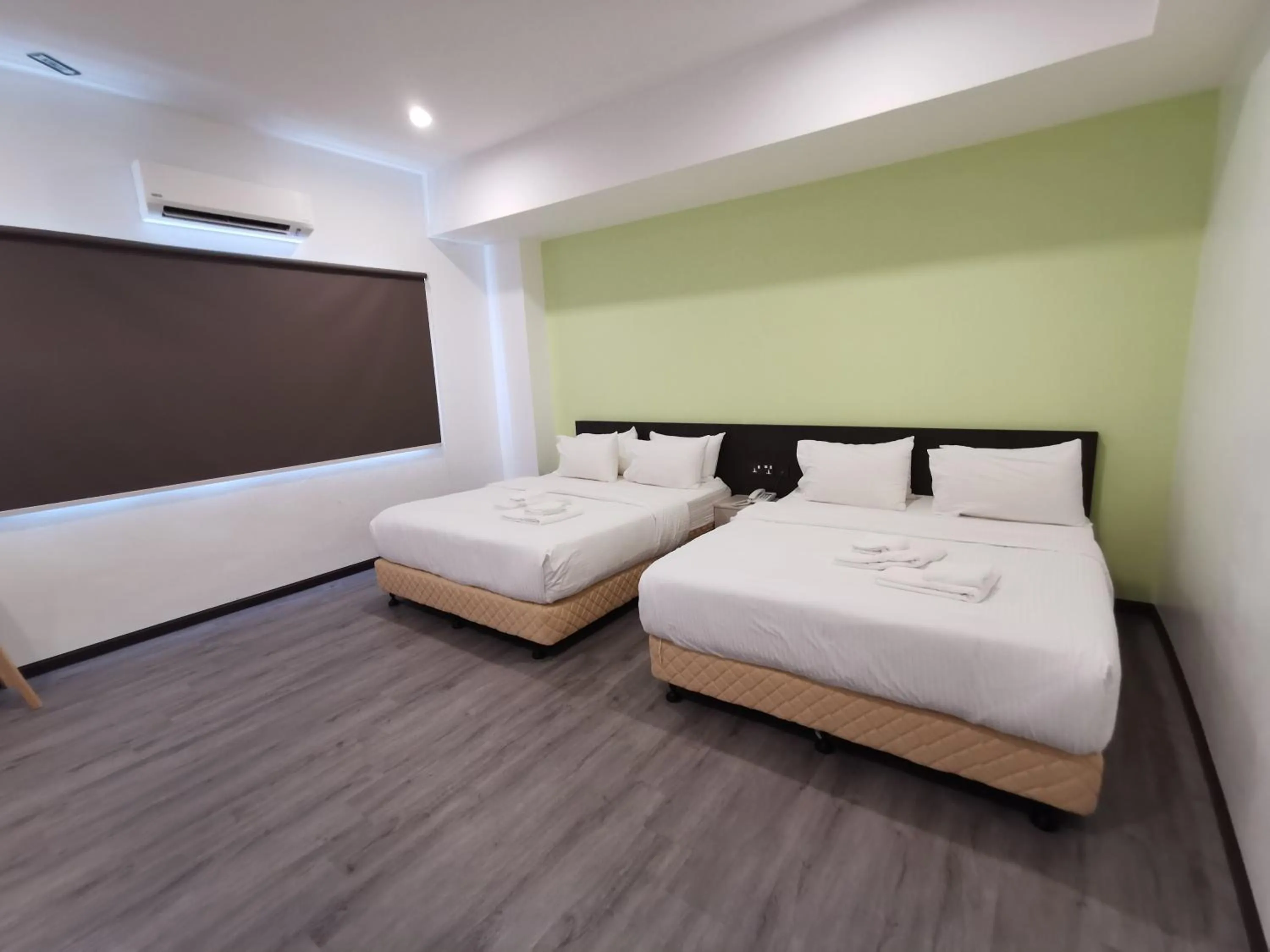 Photo of the whole room, Bed in TT Dorf Hotel Matang