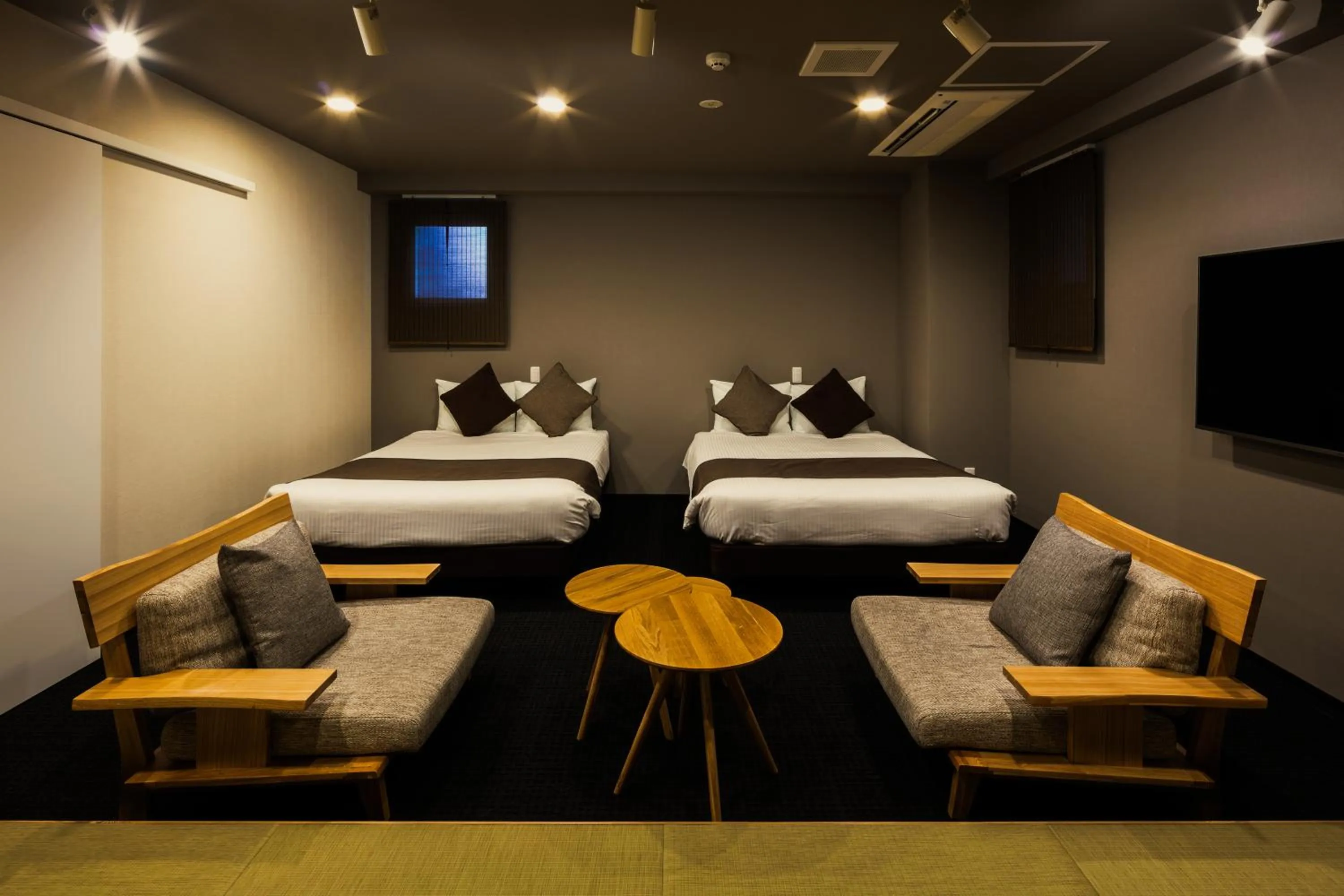 Living room, Bed in Randor Residence Susukino Suites