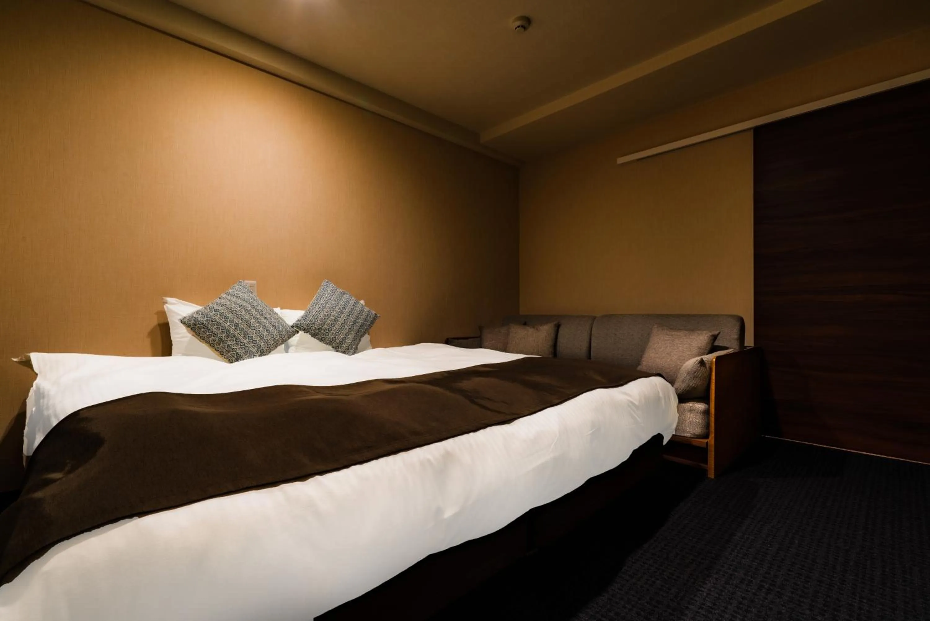 Bedroom, Bed in Randor Residence Susukino Suites