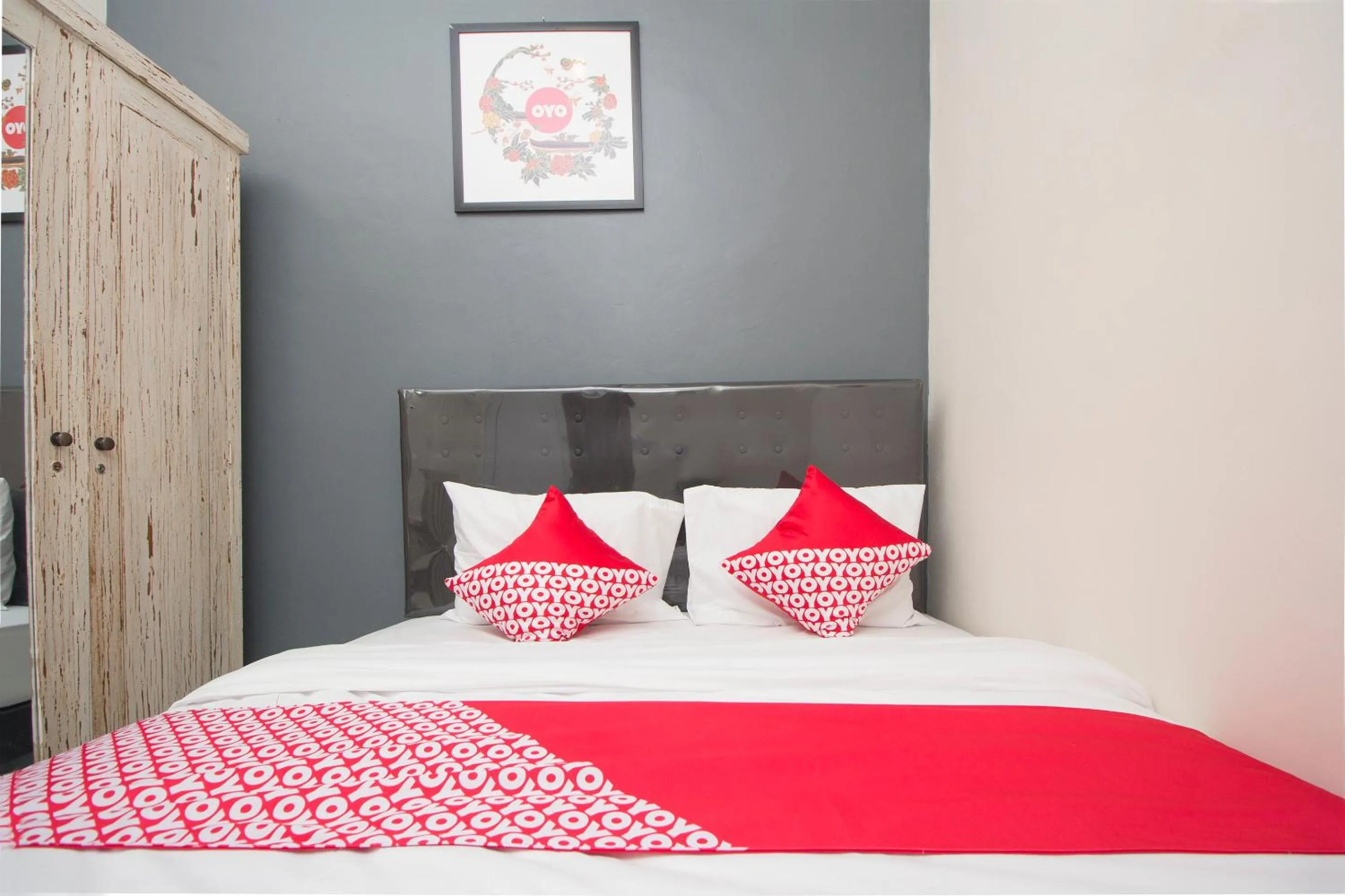 Bedroom in OYO 647 Irooms Homestay