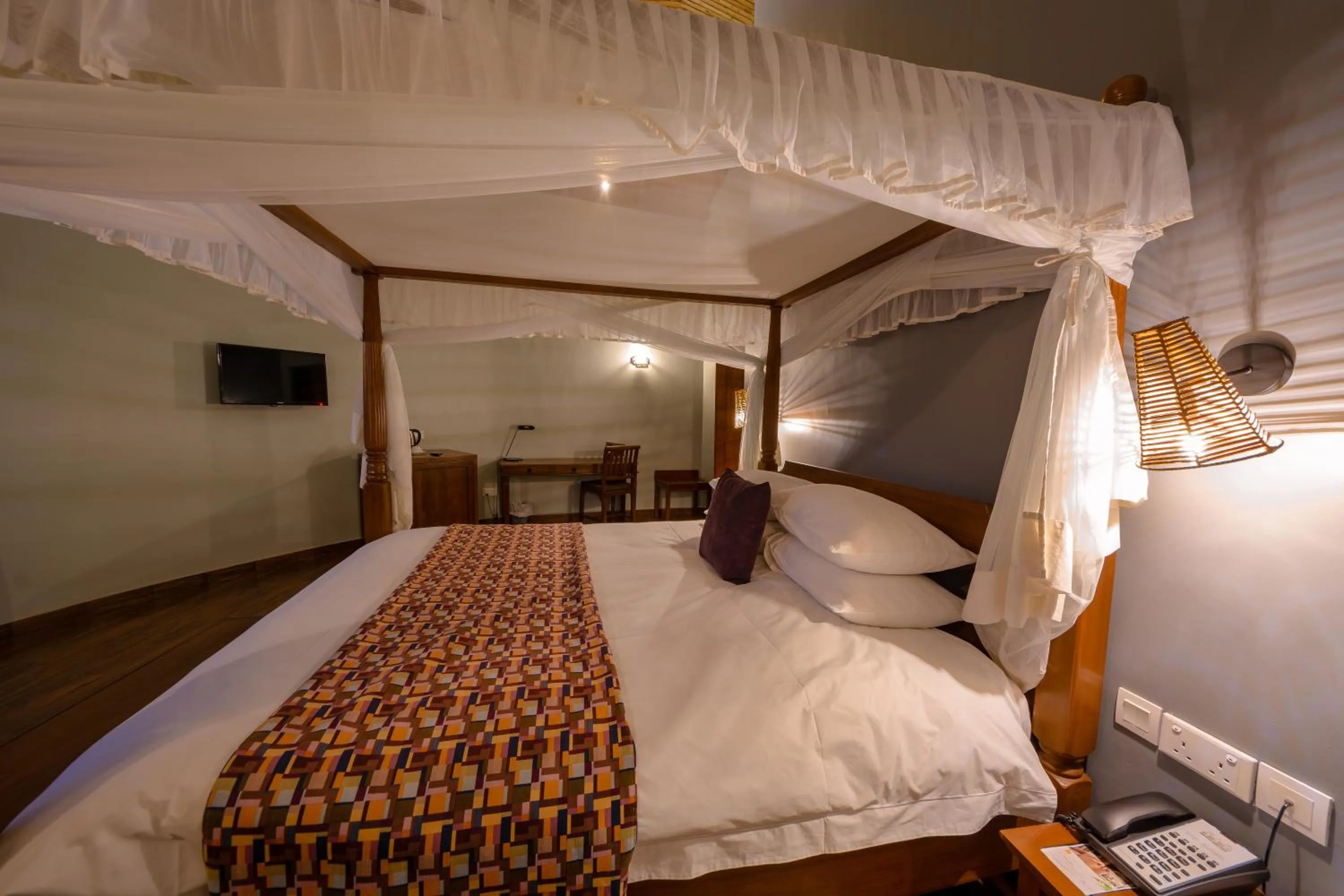 Bed in Emburara Farm Lodge