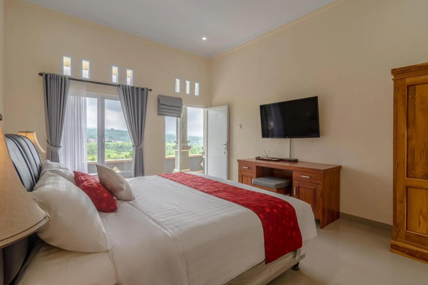 Bed in Adhi Jaya Suite