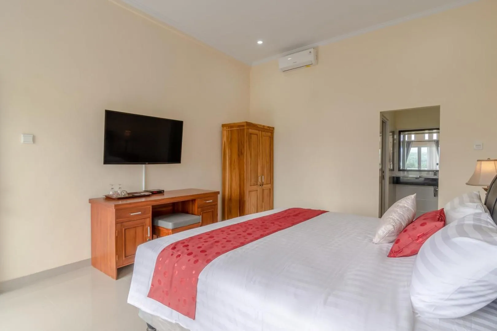 Bed in Adhi Jaya Suite