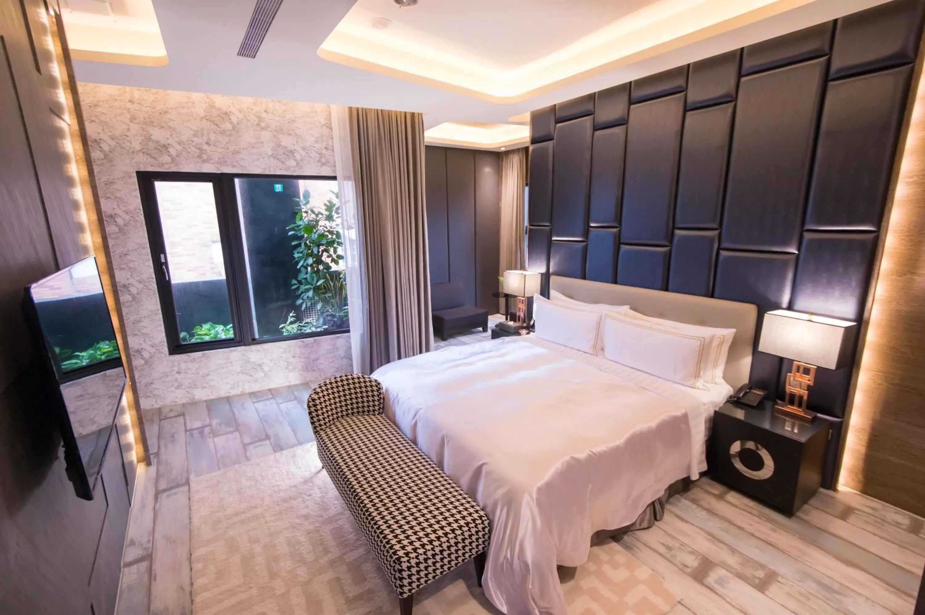 Bed in J Moon Villa Motel