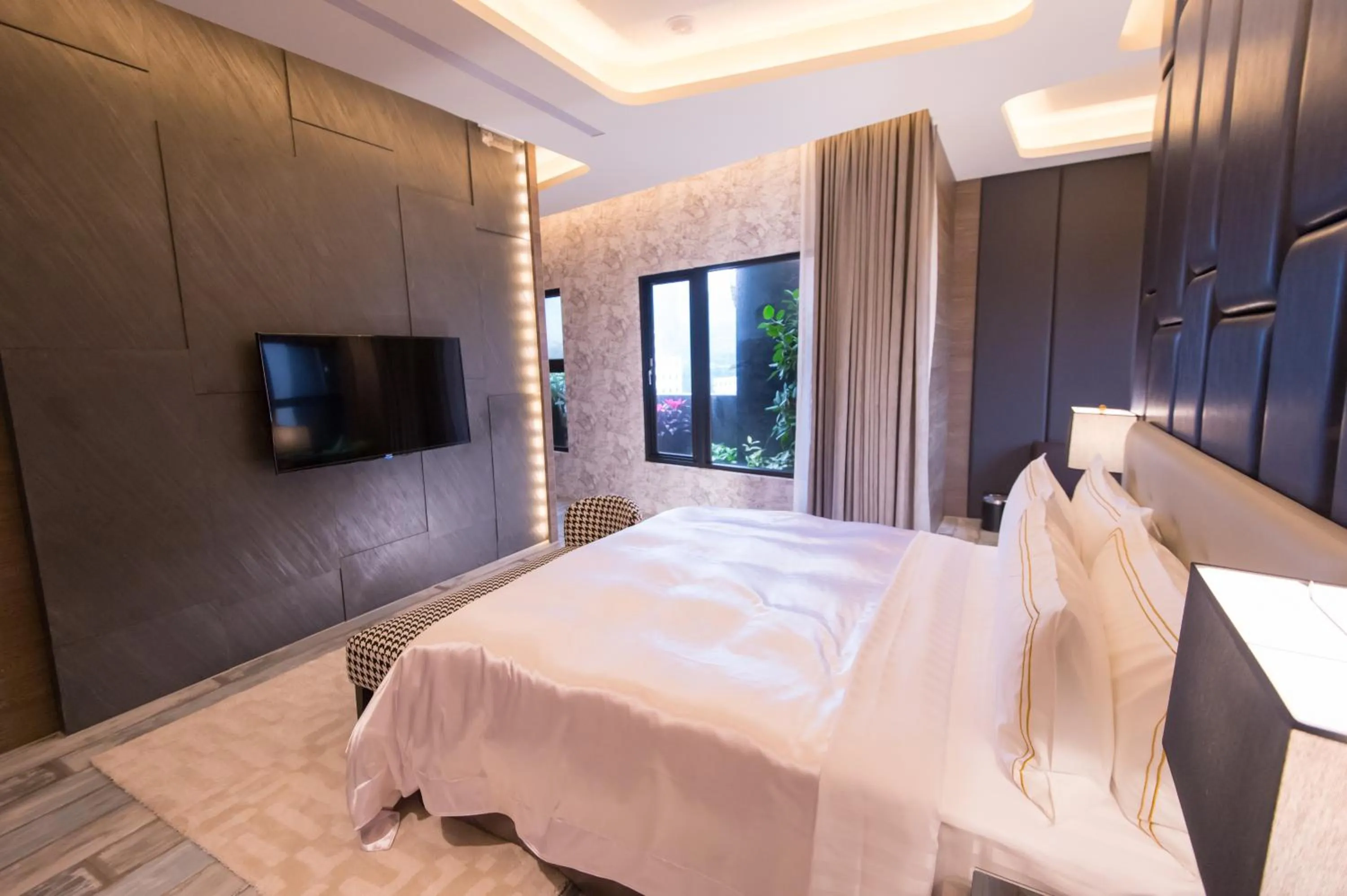 Bed in J Moon Villa Motel