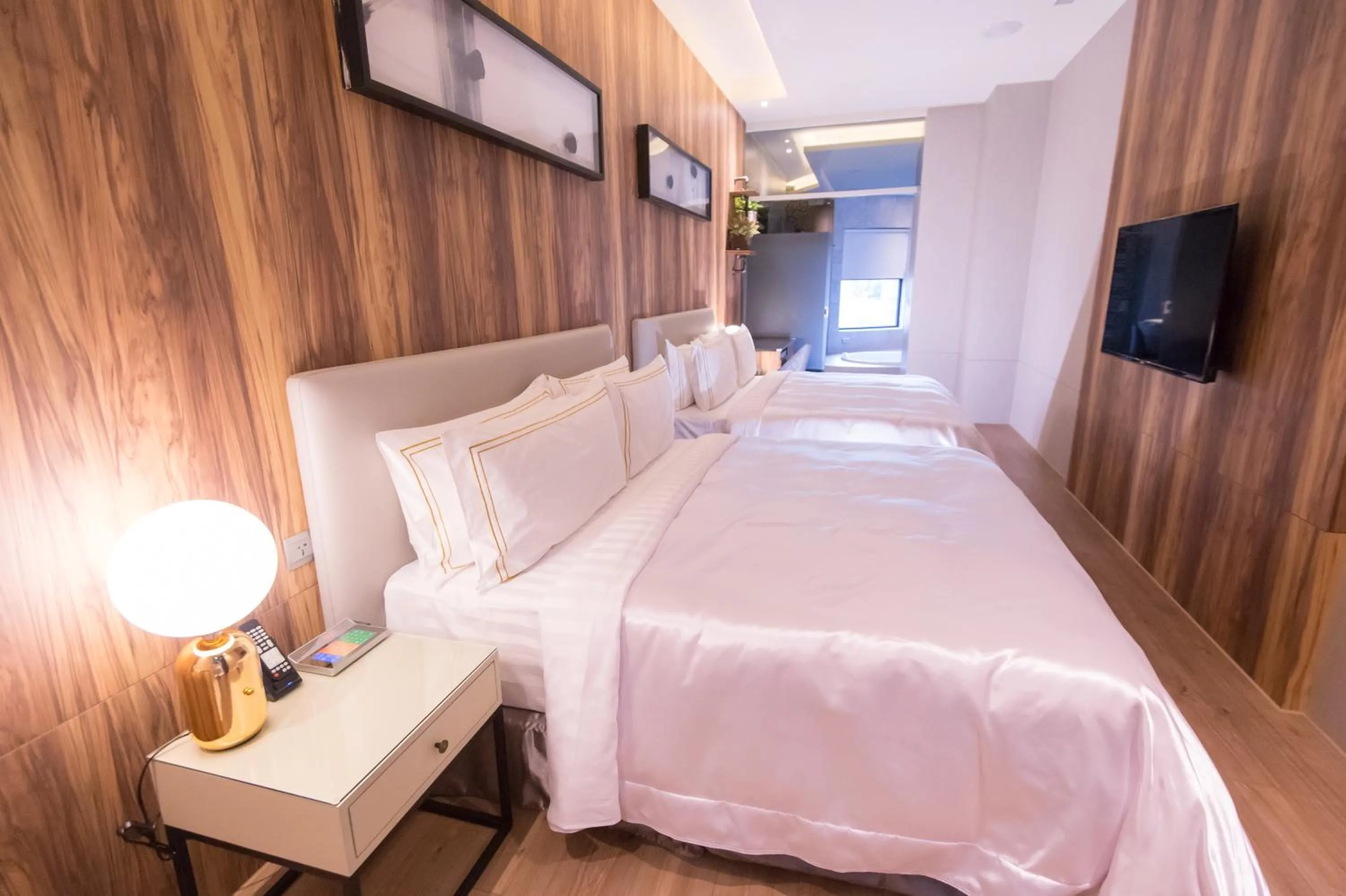 Bed in J Moon Villa Motel