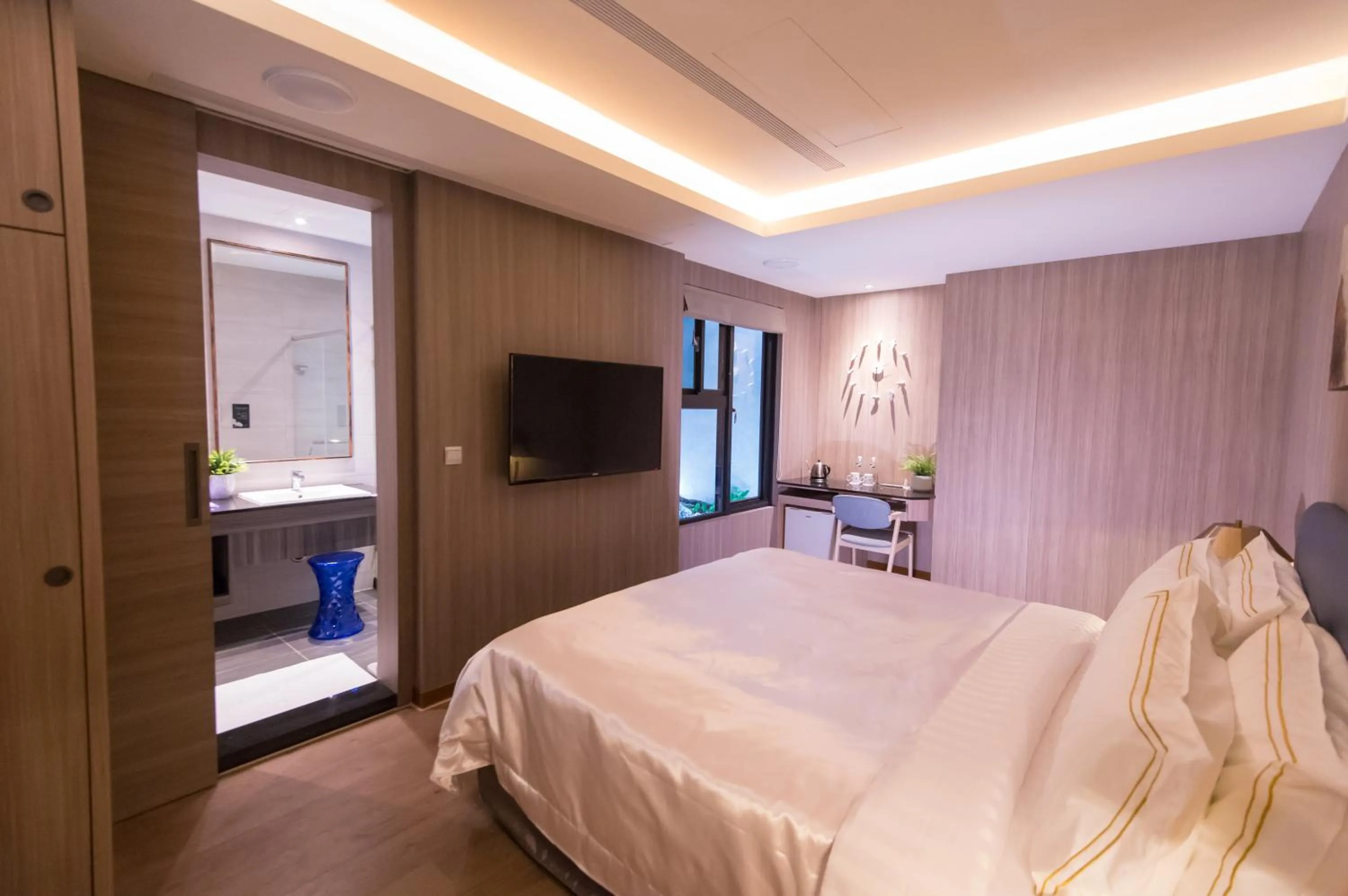 Bed in J Moon Villa Motel