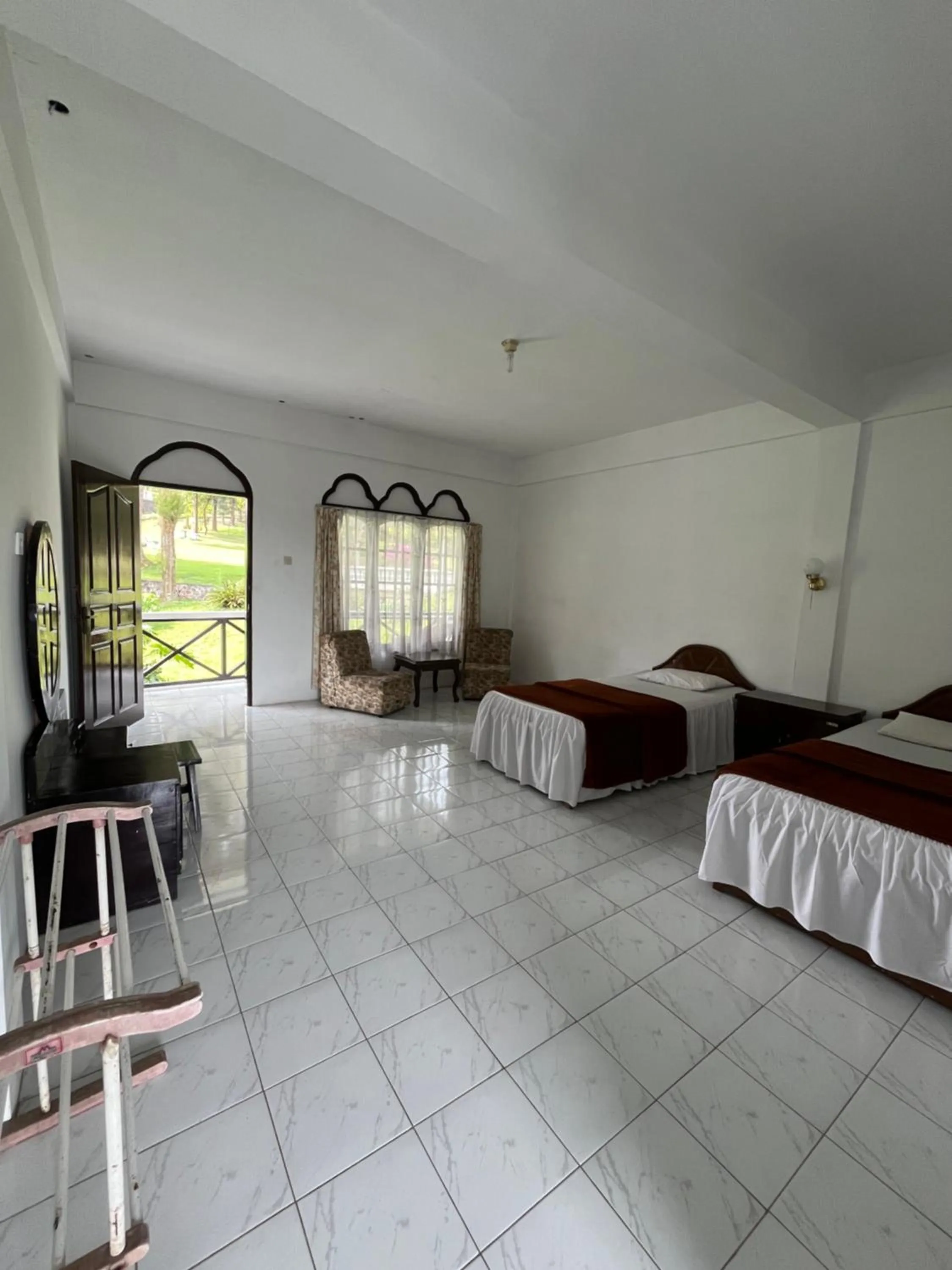 Bed in Sibayak Multinational Rest House