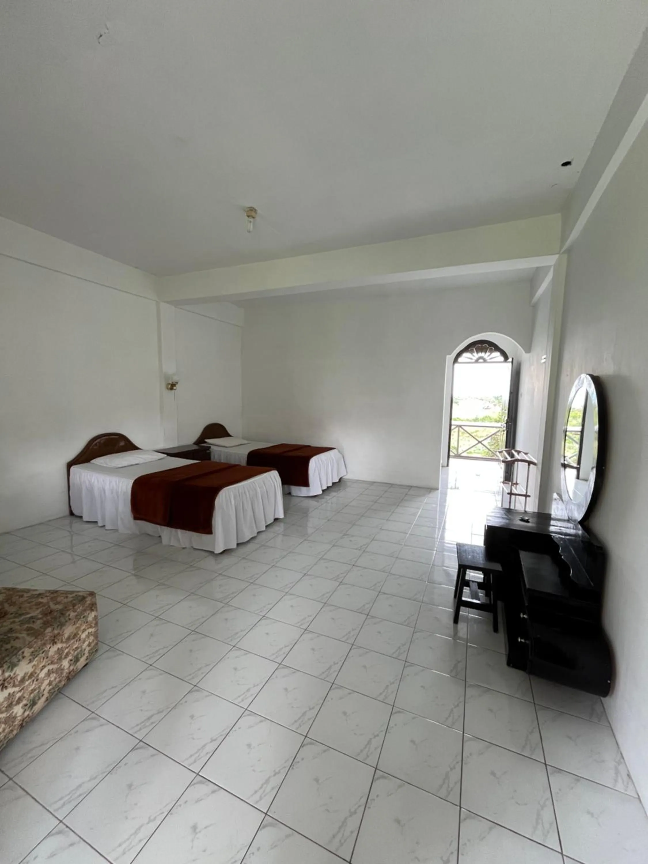 Bed in Sibayak Multinational Rest House