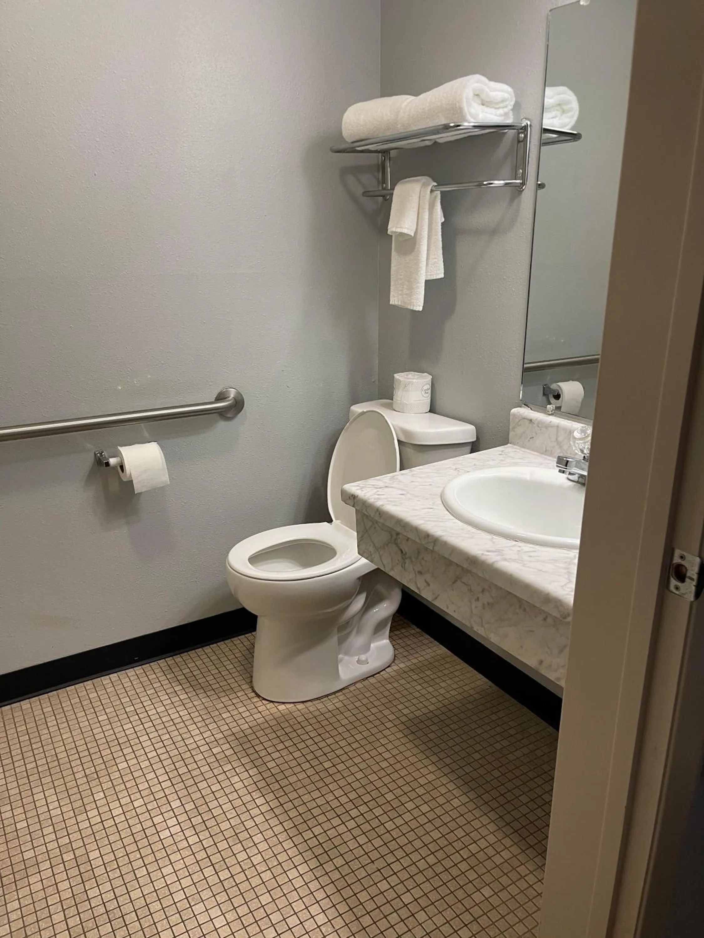 Toilet in Quality Inn Frontier at US Hwy 30