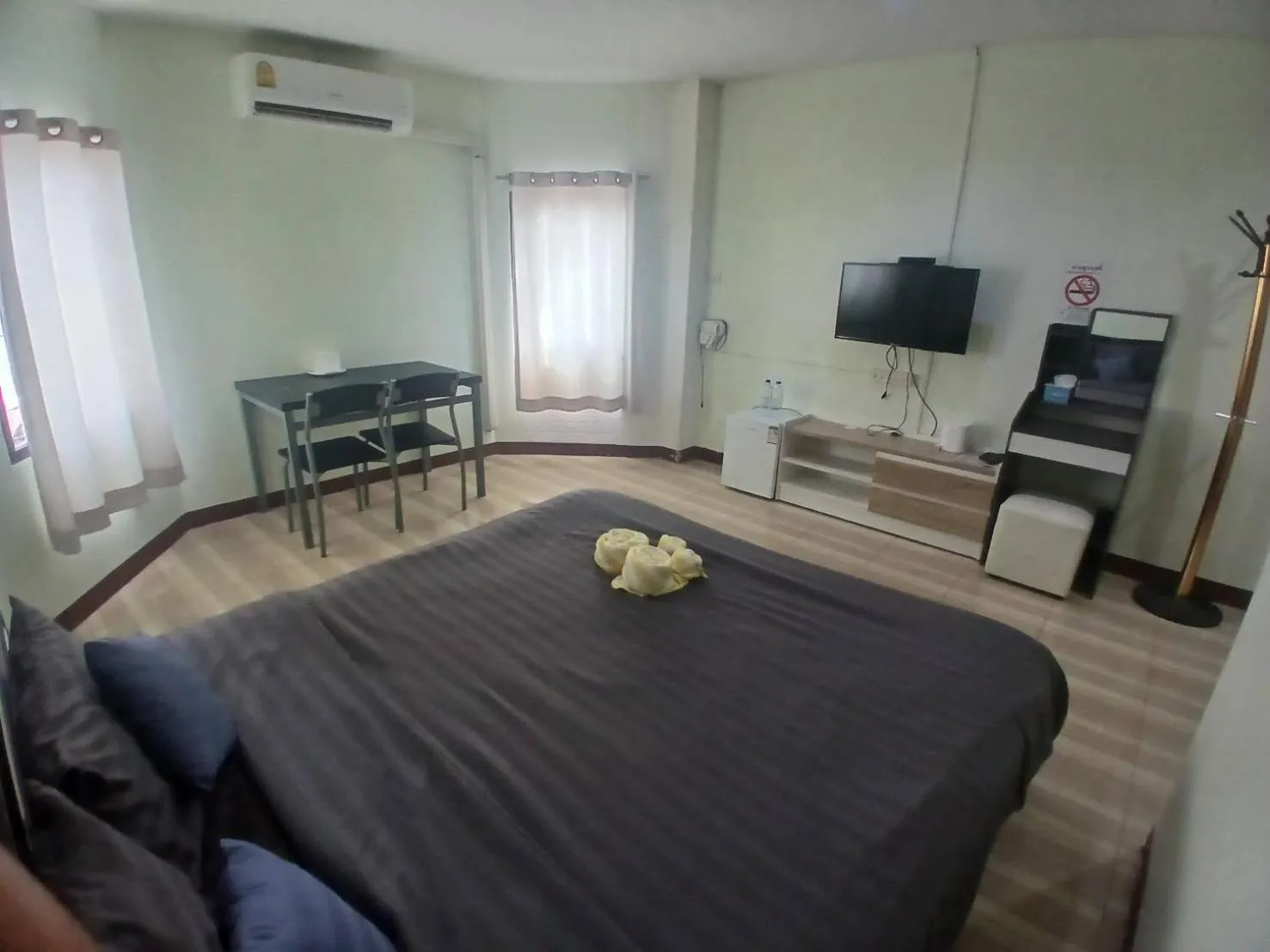 Bed in Alongkorn hotel by SB