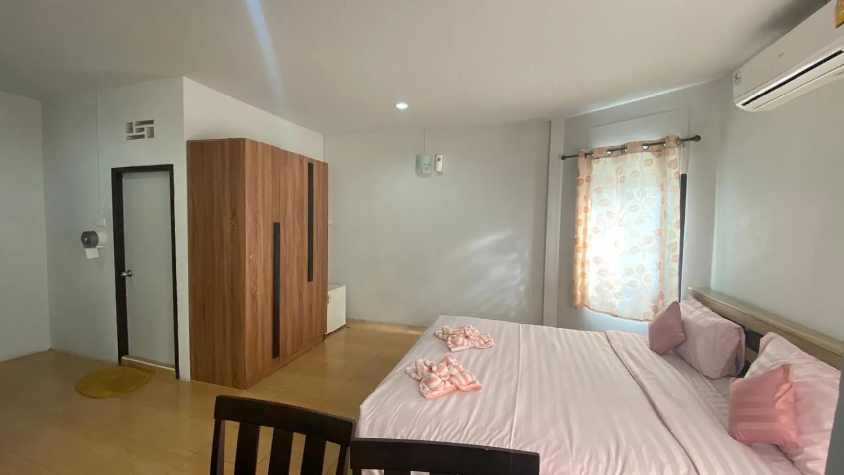 Bed in Alongkorn hotel by SB