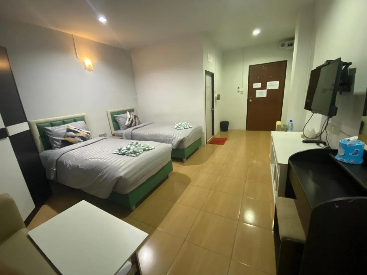 Bed in Alongkorn hotel by SB