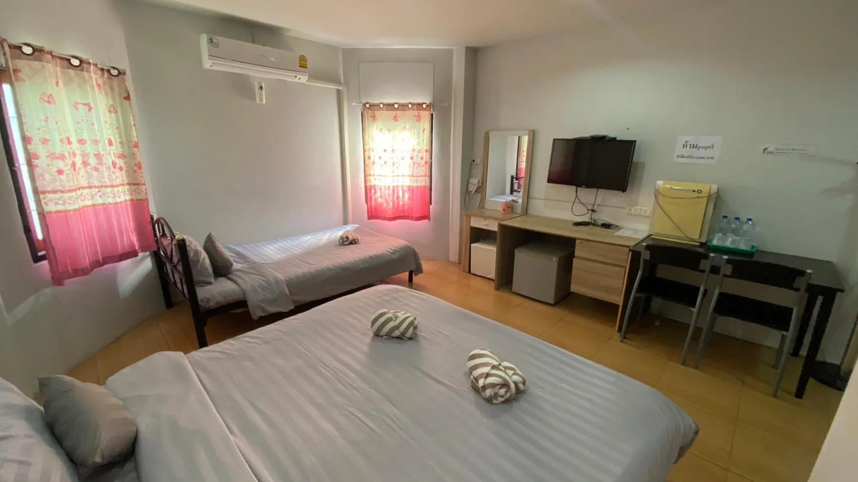 Bed in Alongkorn hotel by SB