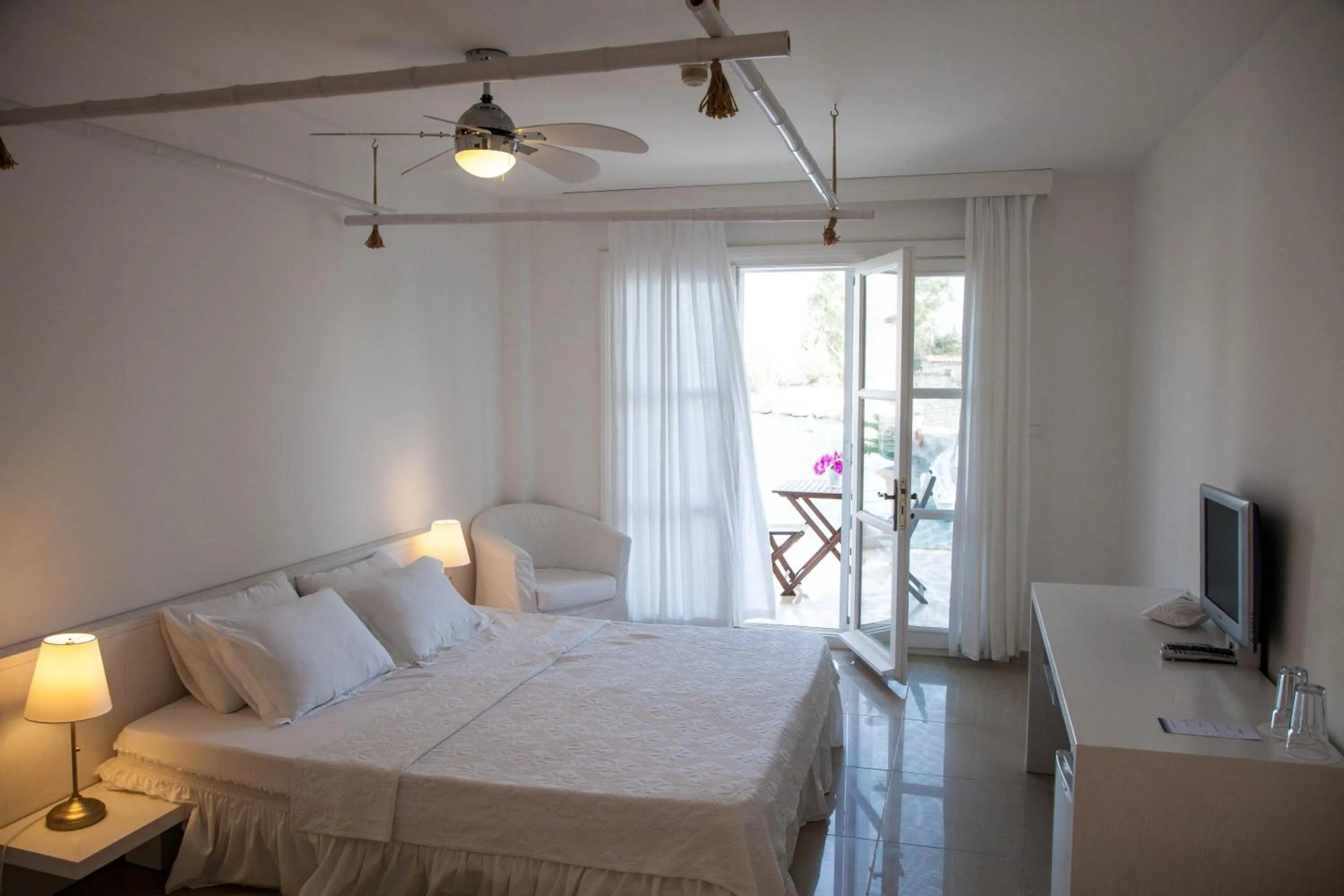 Photo of the whole room, Bed in Port Alacati Hotel