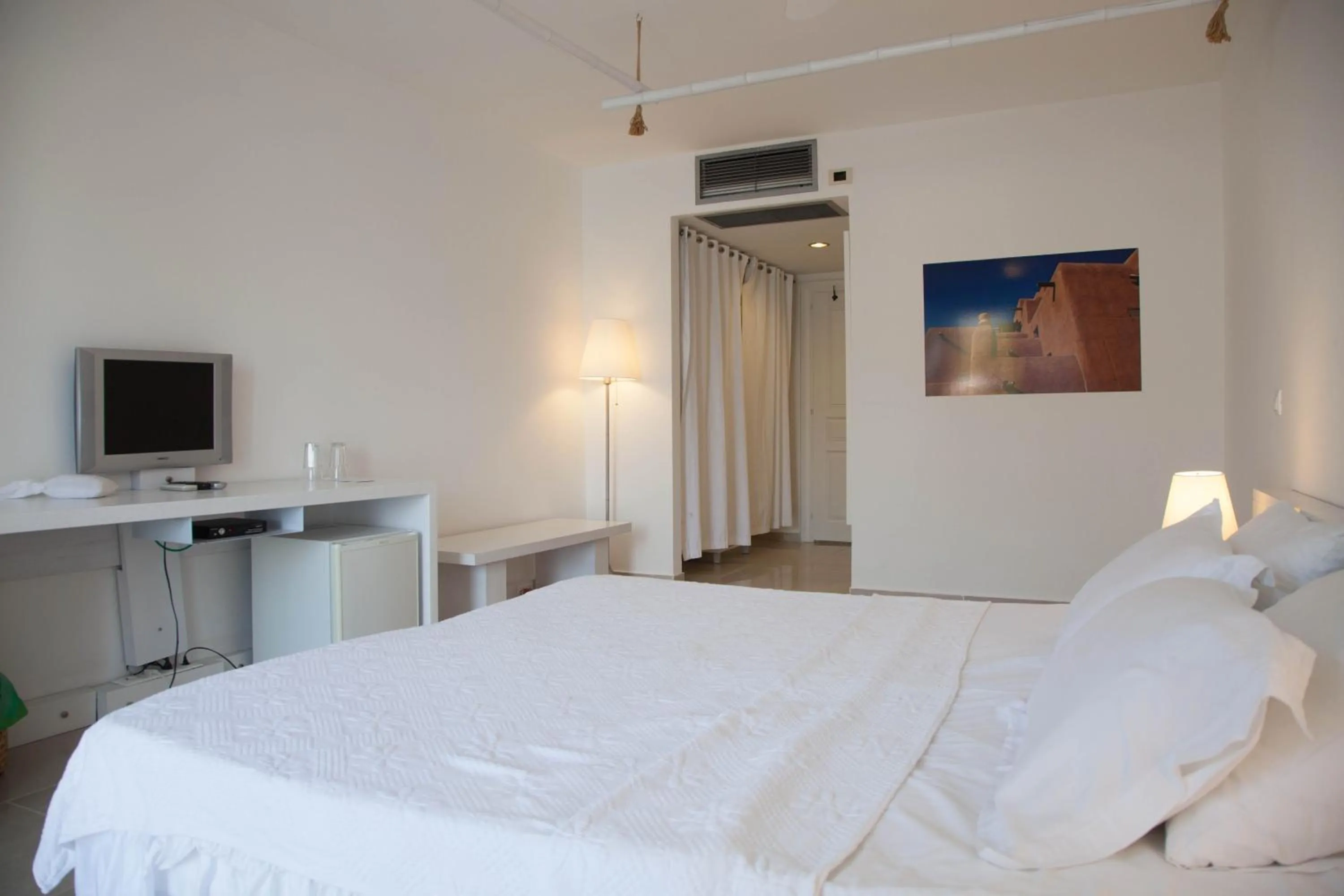 Photo of the whole room, Bed in Port Alacati Hotel