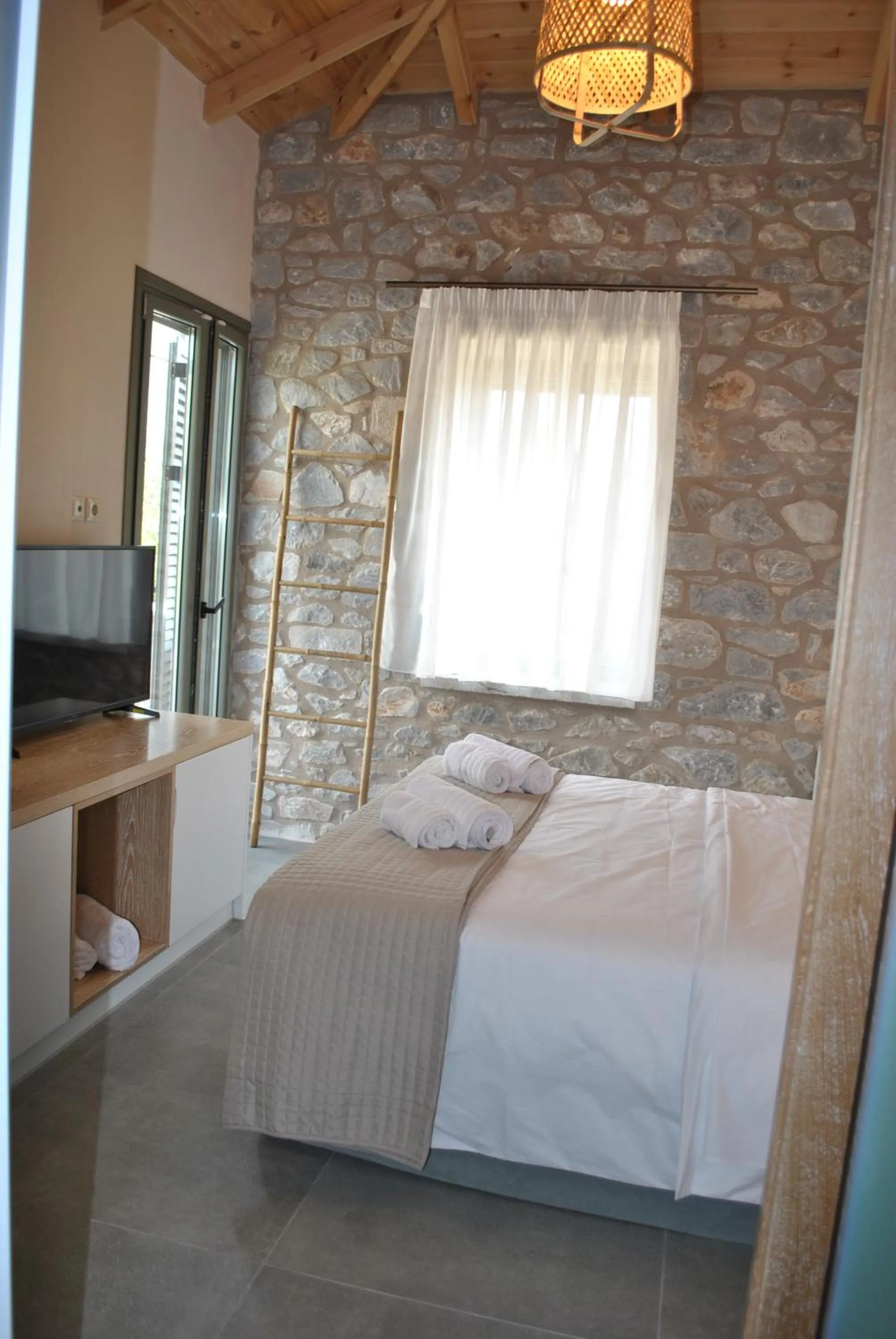 Bed in Petras Gi - Stone Houses