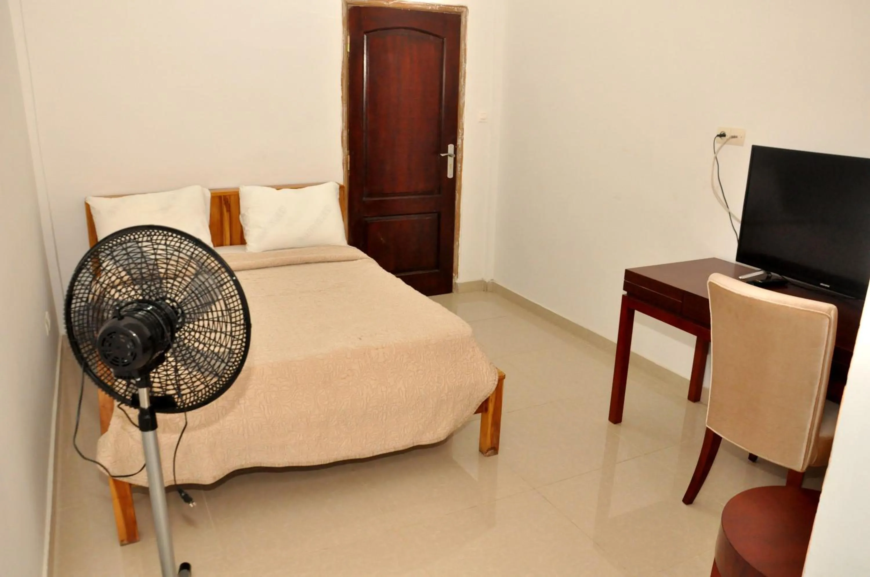 Bed in HOTEL AMBASSADORS ANNEXE