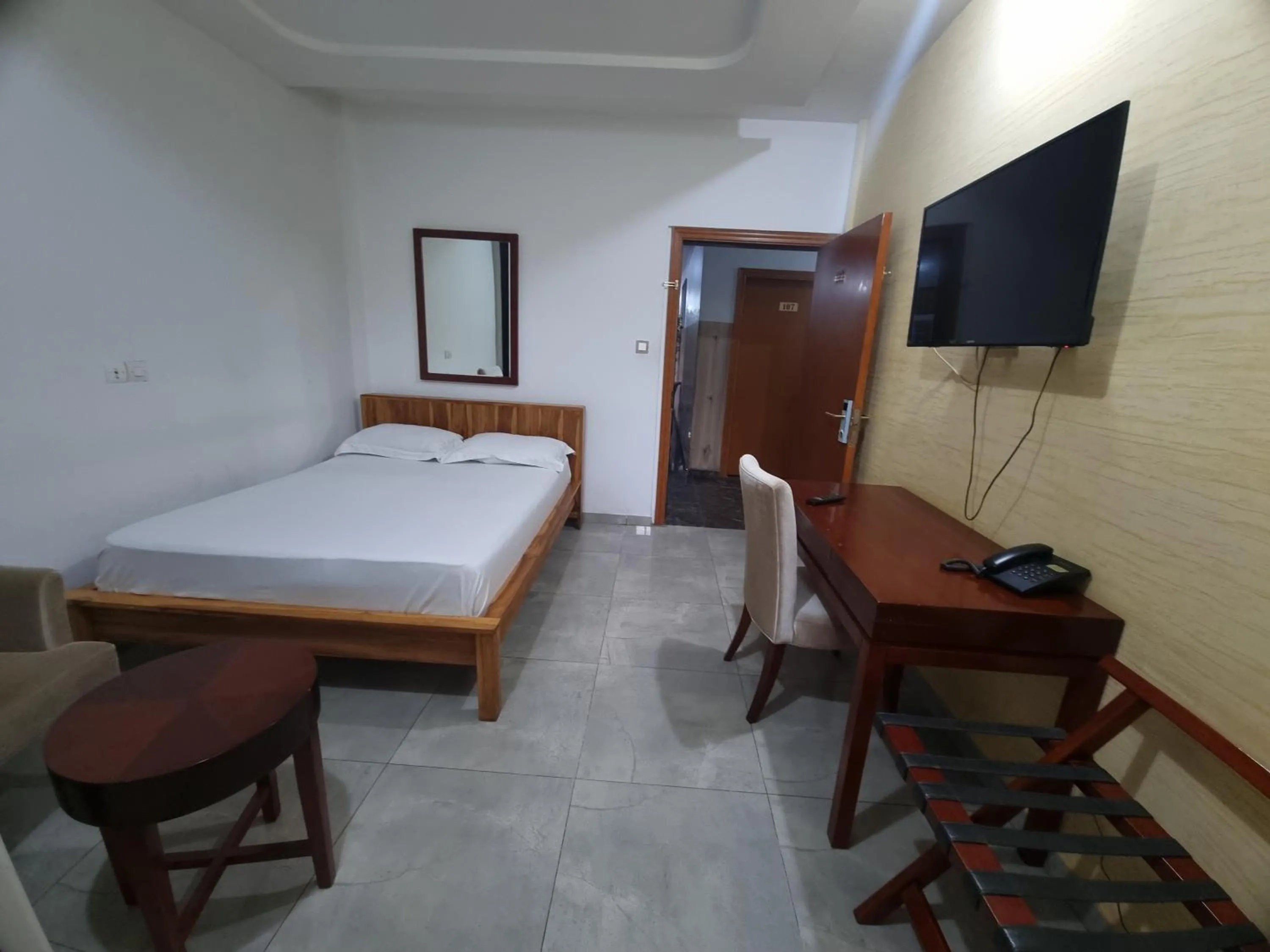 Bed in HOTEL AMBASSADORS ANNEXE