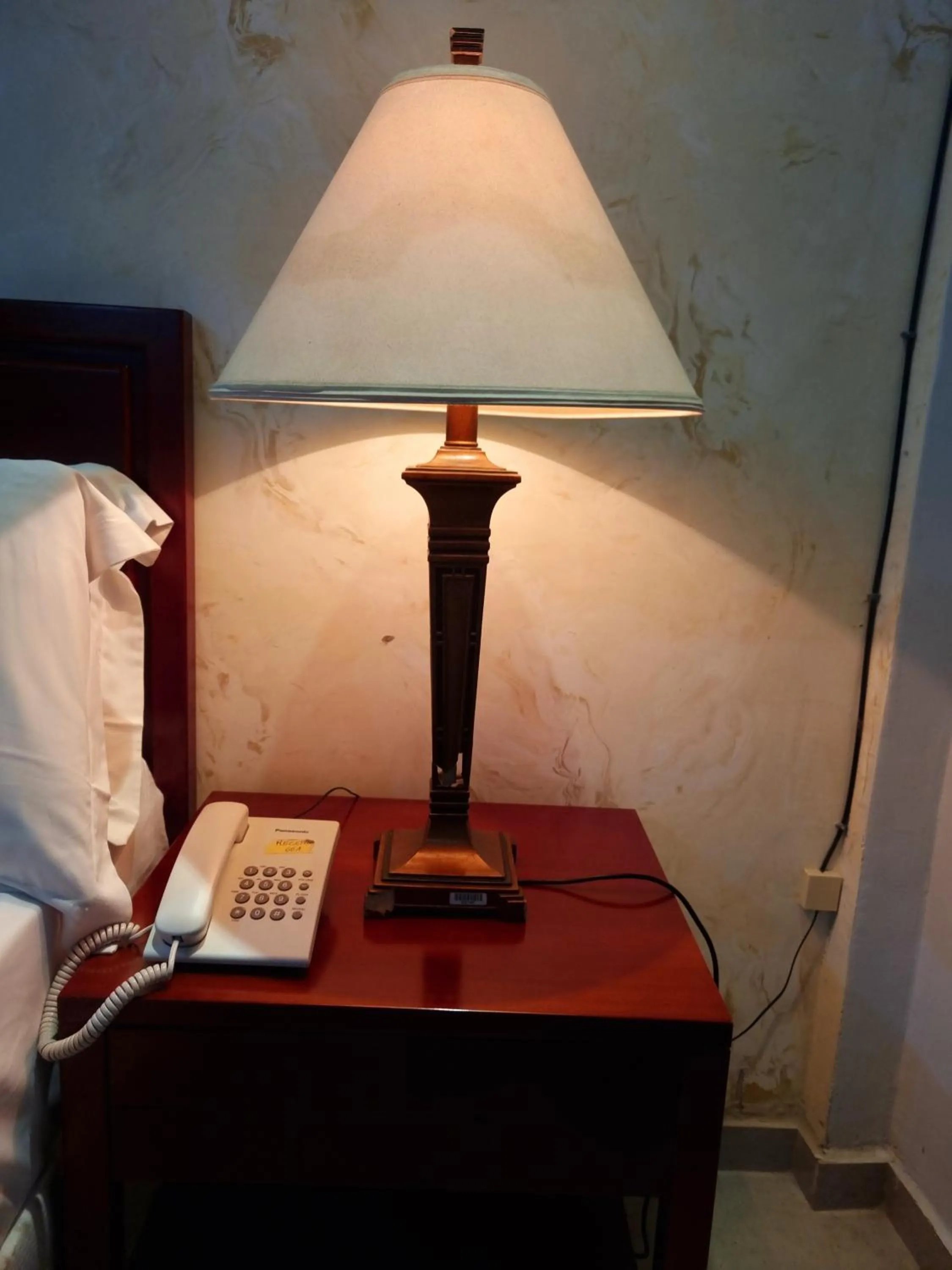 Bed in HOTEL AMBASSADORS ANNEXE