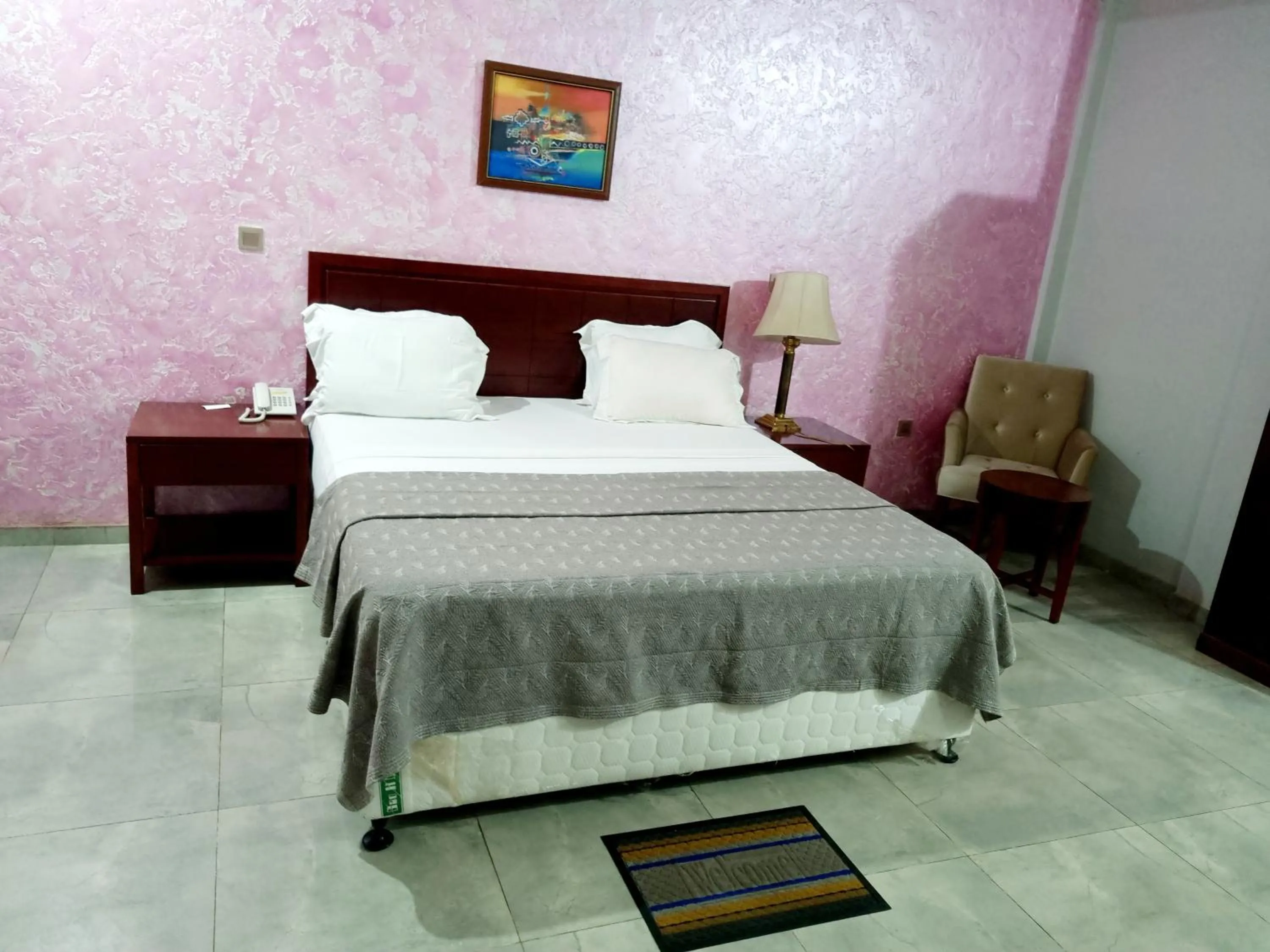 Bed in HOTEL AMBASSADORS ANNEXE