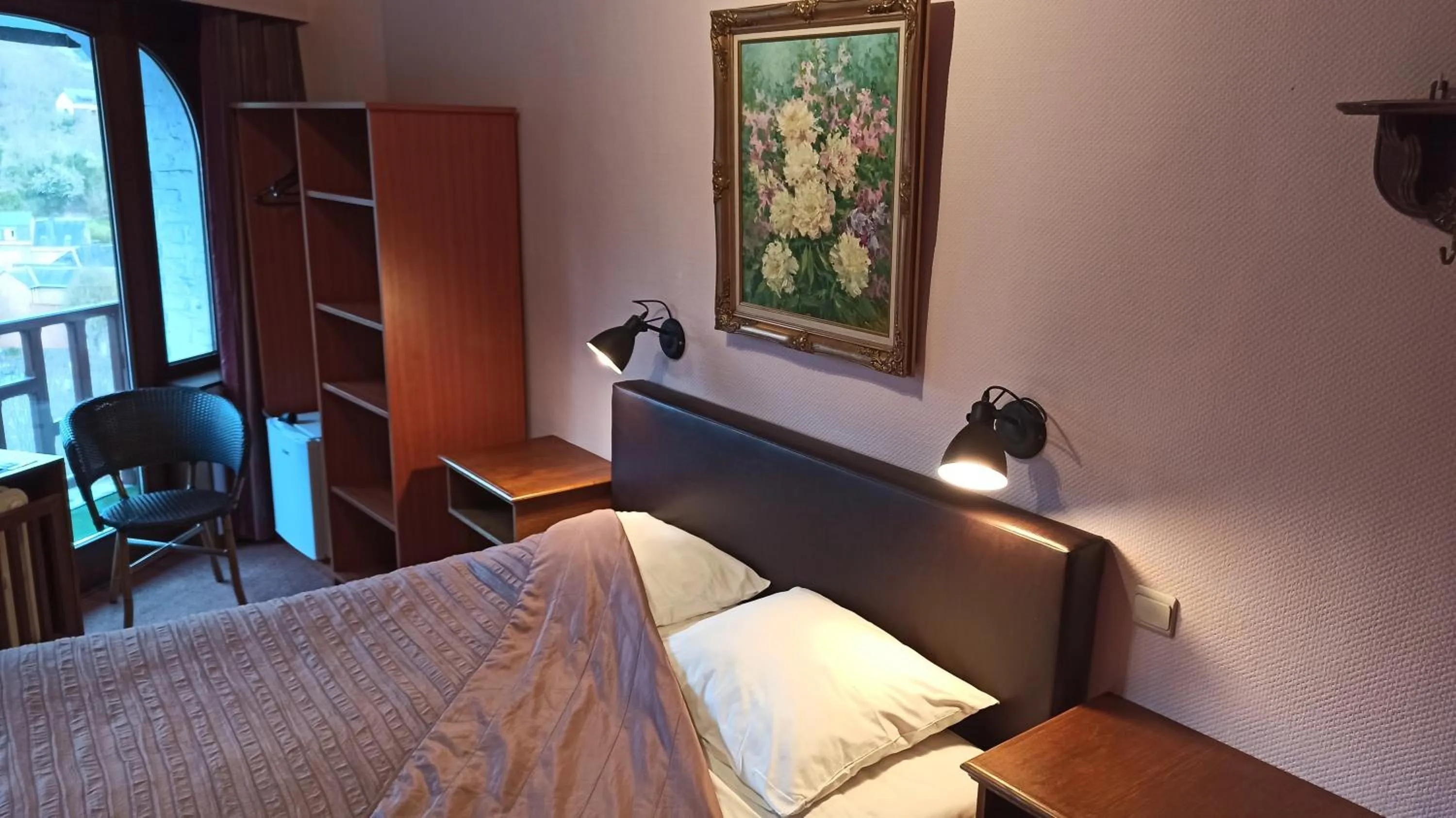 Bed in Hotel Le Chalet