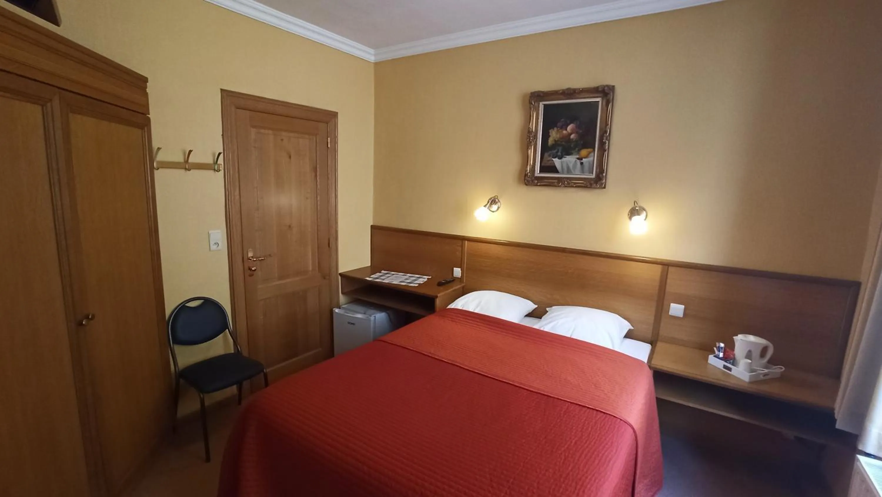 Bed in Hotel Le Chalet