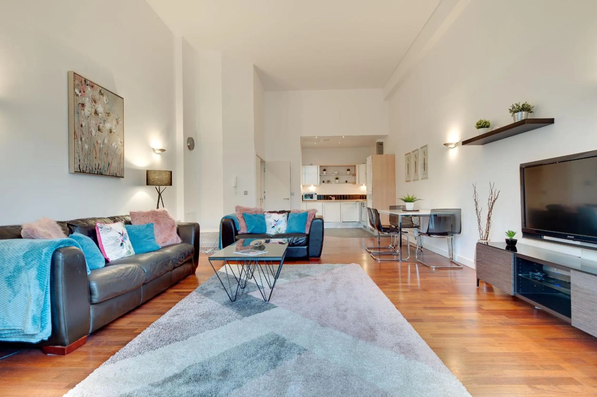 Living room in Crown Apartments 1C by Week2Week