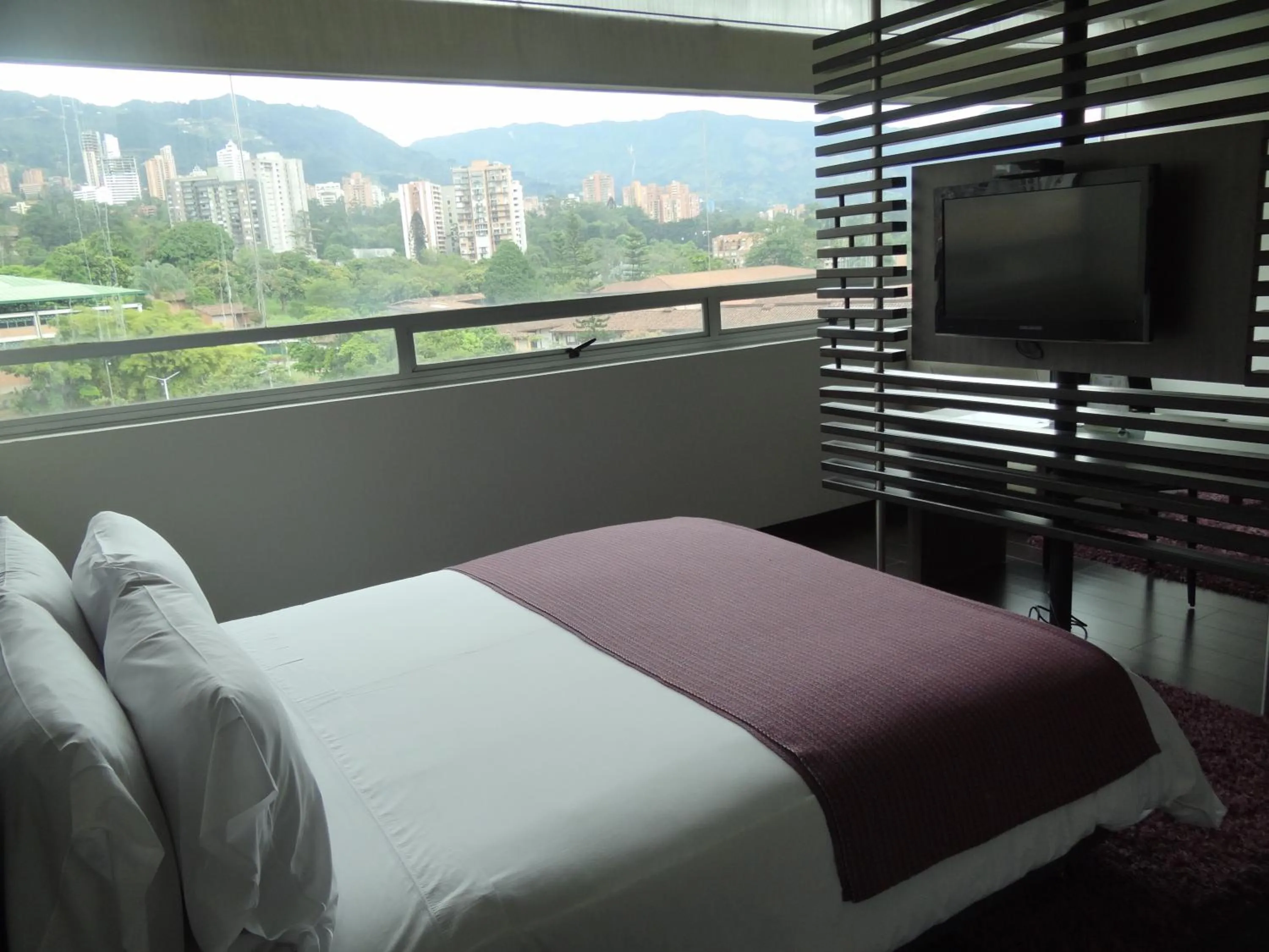 Bedroom, Bed in Hotel bh El Poblado