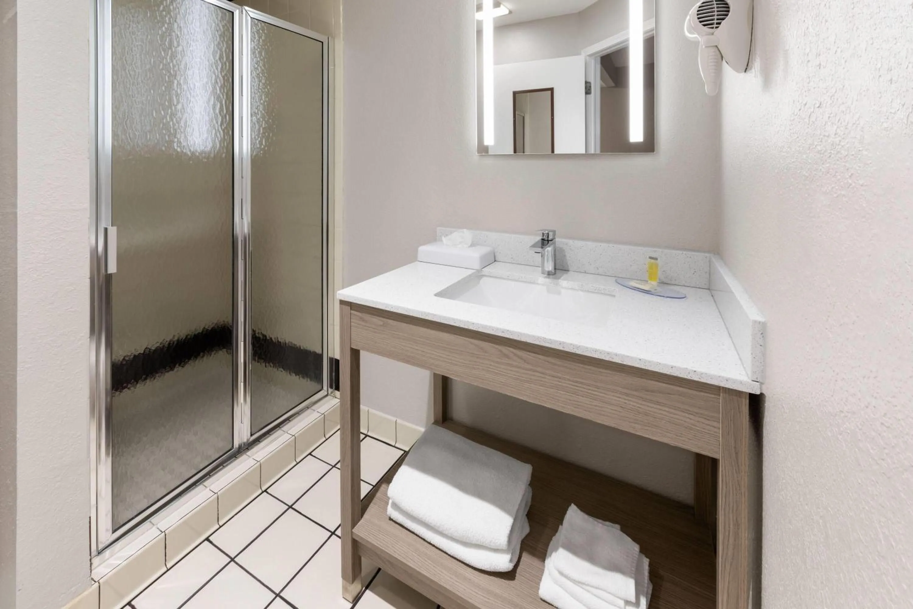 Bathroom in Super 8 by Wyndham Marysville/Port Huron Area