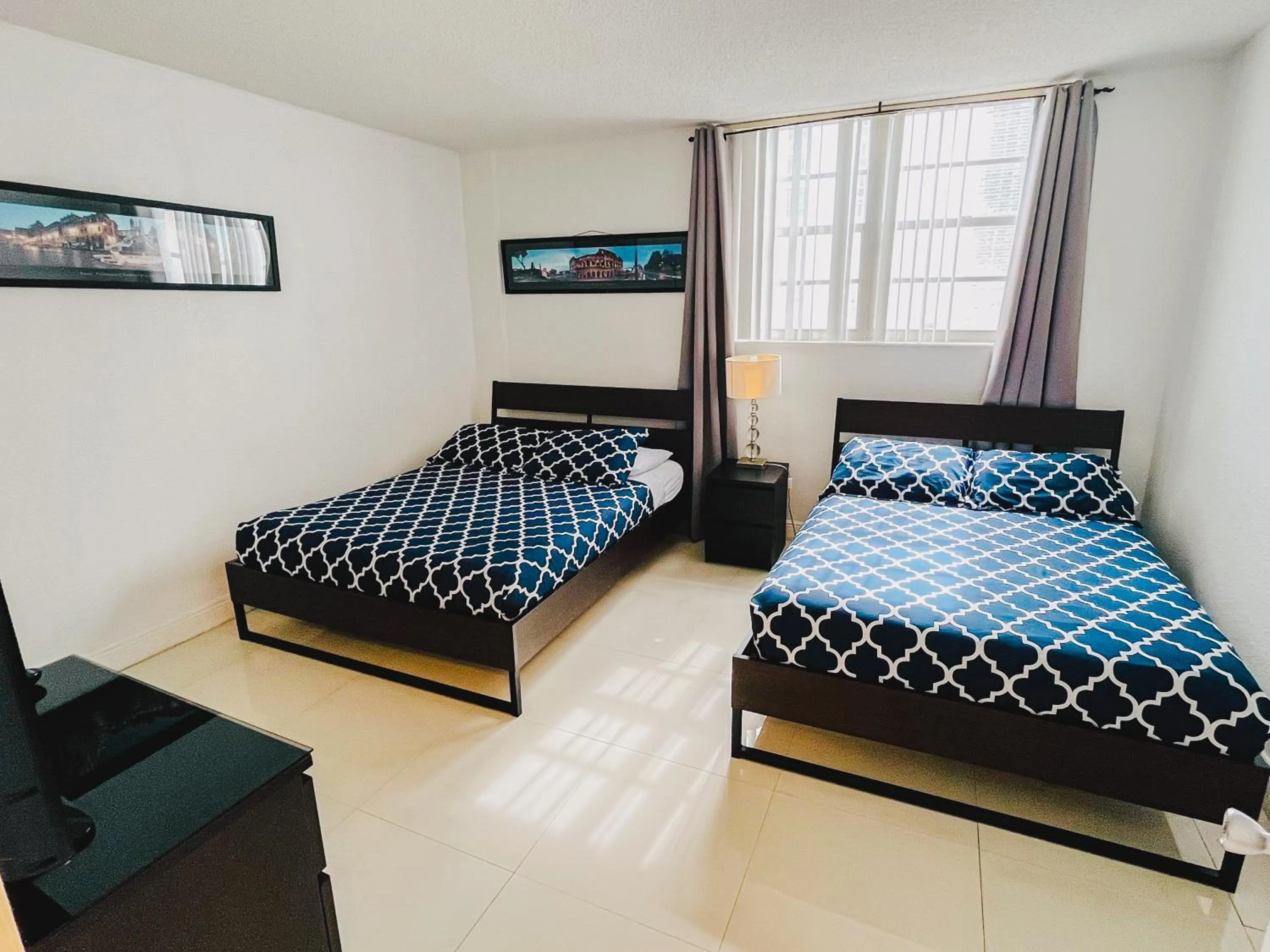 Bed in Miami Hallandale Condo, Partial Ocean View Direct Beach and Pool Access Miami Hollywood Beach