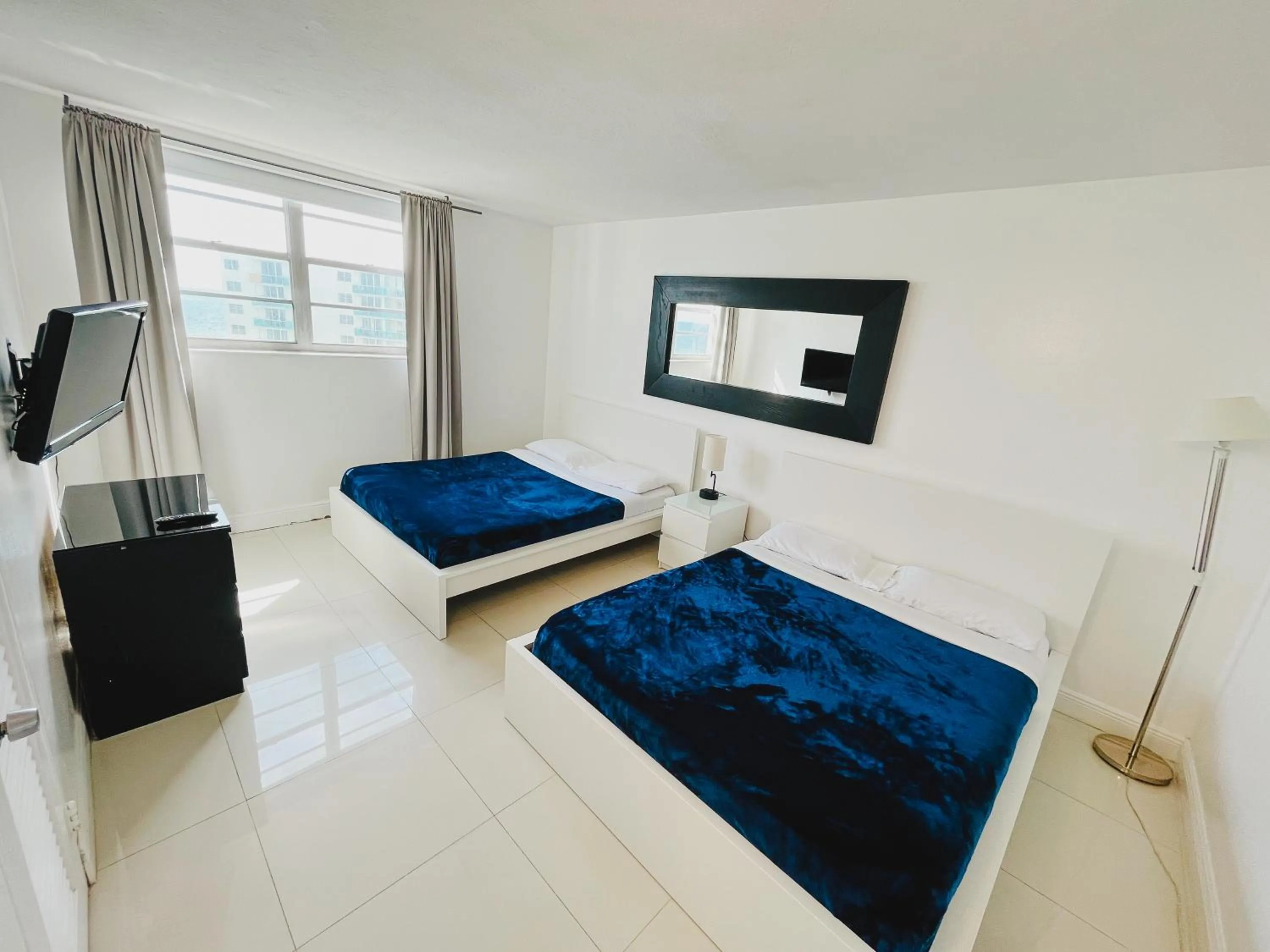 Bed in Miami Hallandale Condo, Partial Ocean View Direct Beach and Pool Access Miami Hollywood Beach