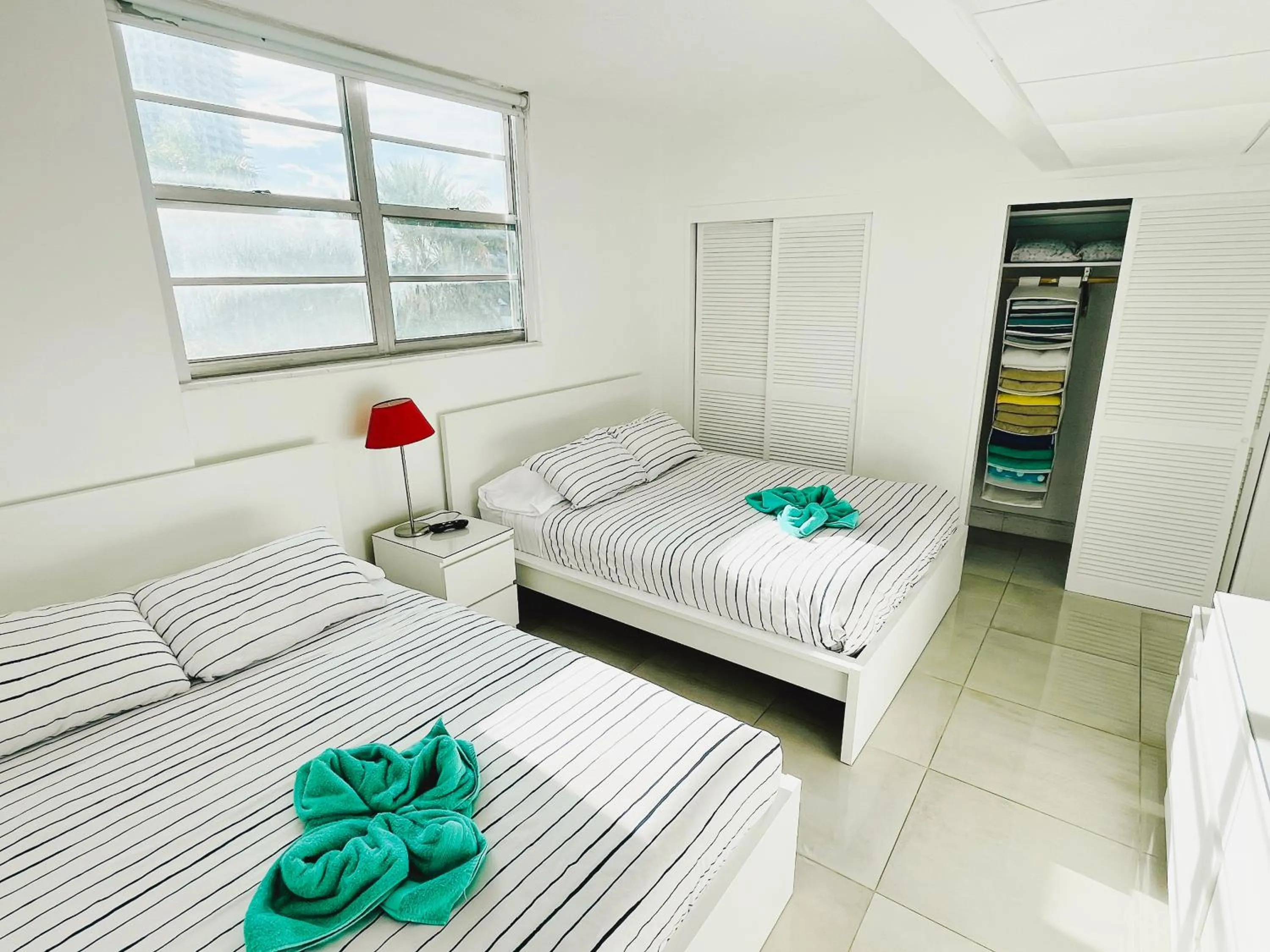 Bed in Miami Hallandale Condo, Partial Ocean View Direct Beach and Pool Access Miami Hollywood Beach