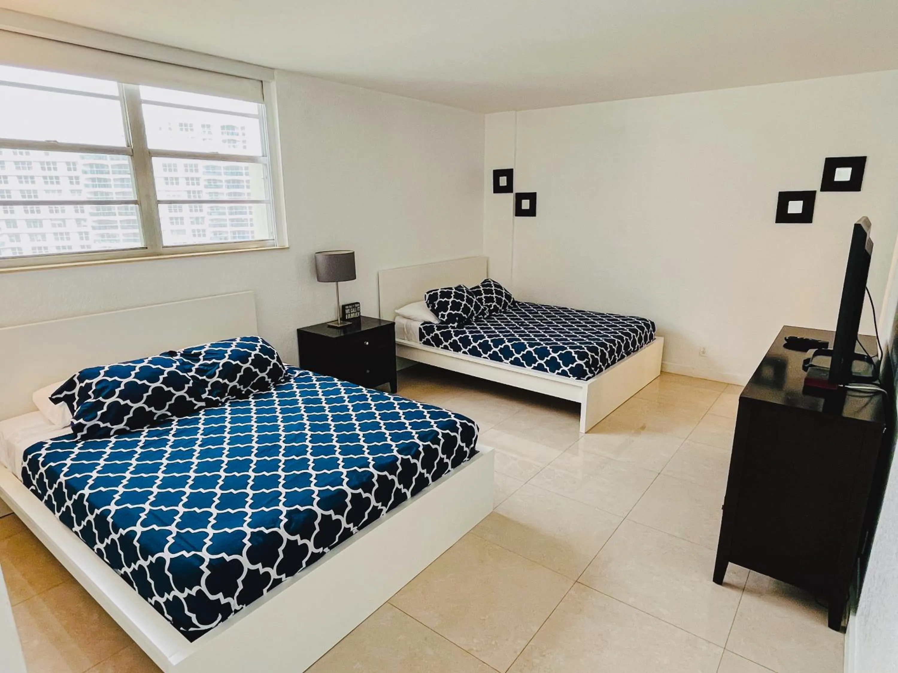 Bed in Miami Hallandale Condo, Partial Ocean View Direct Beach and Pool Access Miami Hollywood Beach