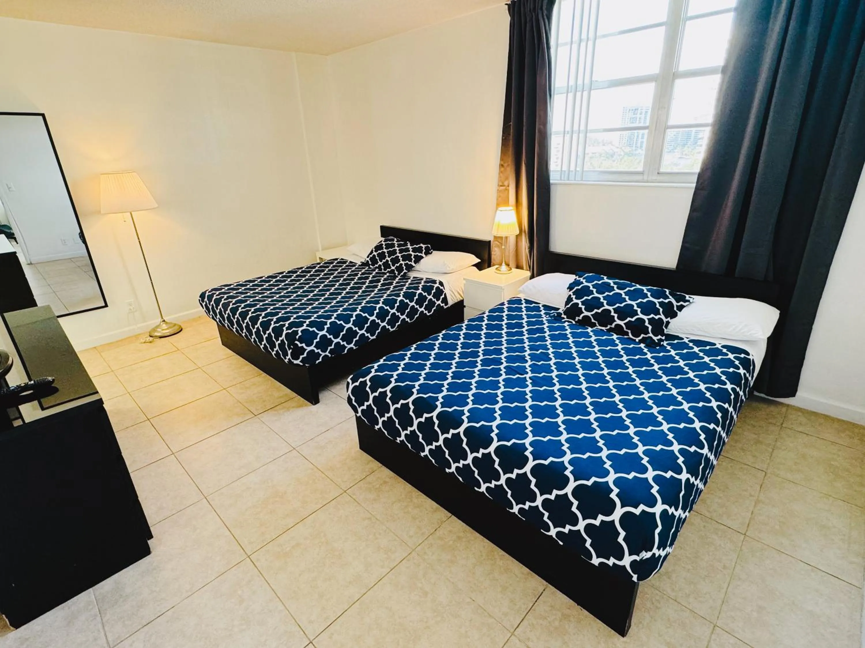 Bed in Miami Hallandale Condo, Partial Ocean View Direct Beach and Pool Access Miami Hollywood Beach