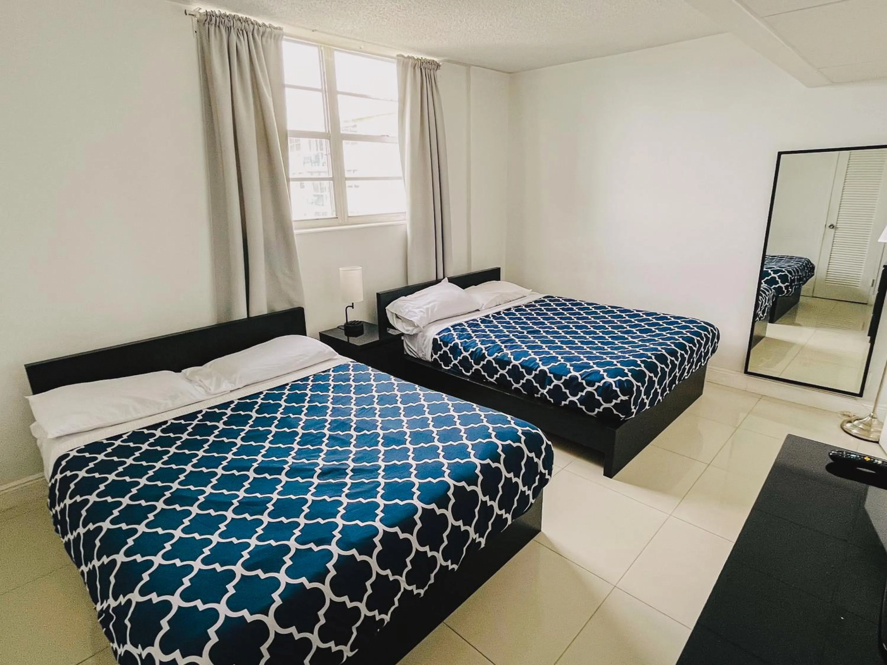 Bed in Miami Hallandale Condo, Partial Ocean View Direct Beach and Pool Access Miami Hollywood Beach