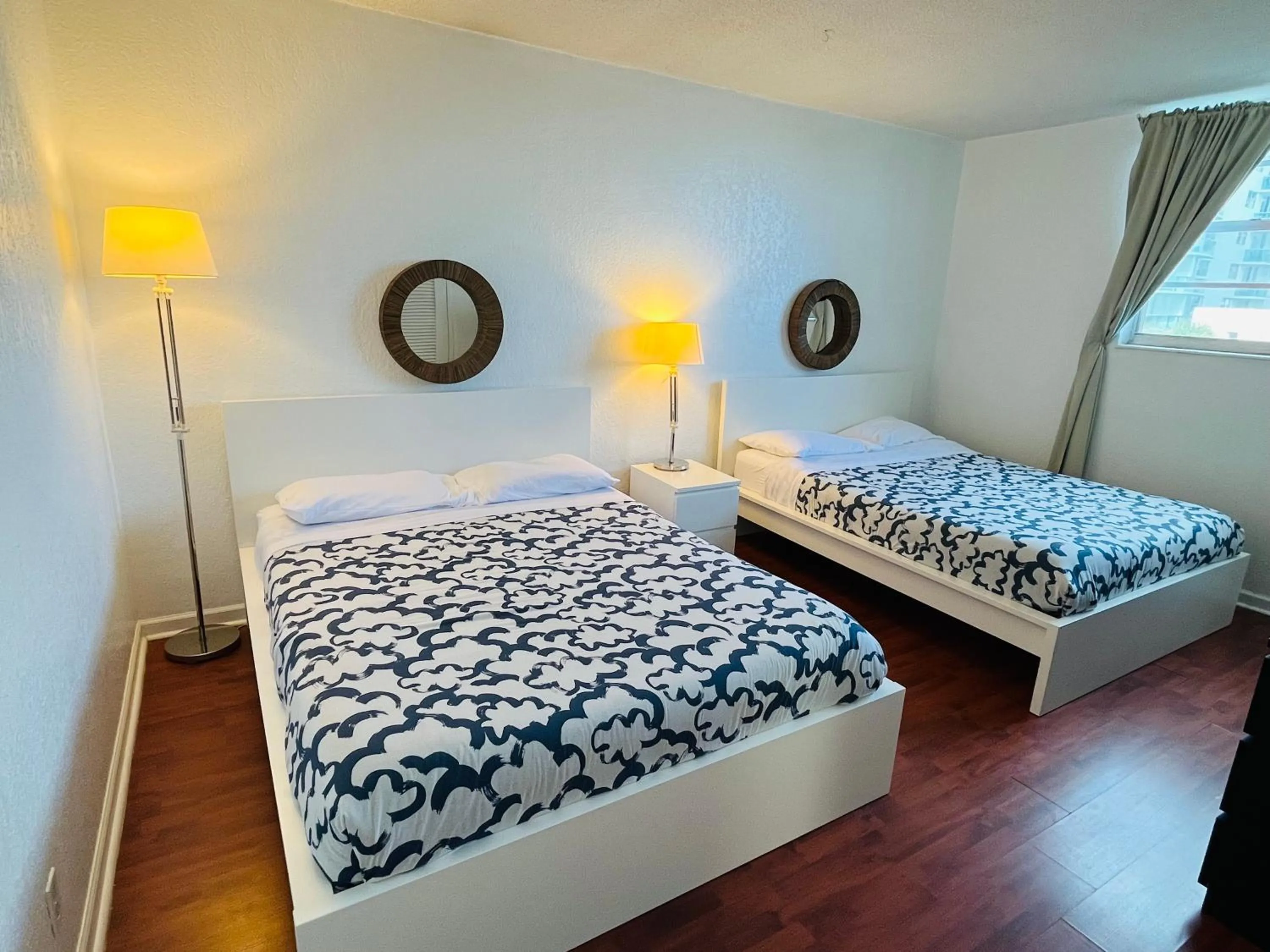 Bed in Miami Hallandale Condo, Partial Ocean View Direct Beach and Pool Access Miami Hollywood Beach