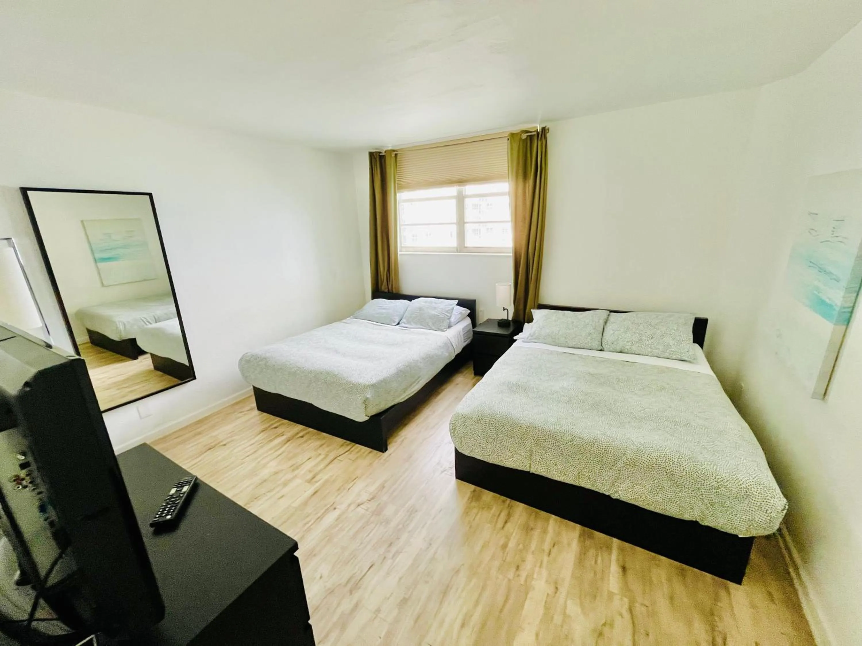 Bed in Miami Hallandale Condo, Partial Ocean View Direct Beach and Pool Access Miami Hollywood Beach