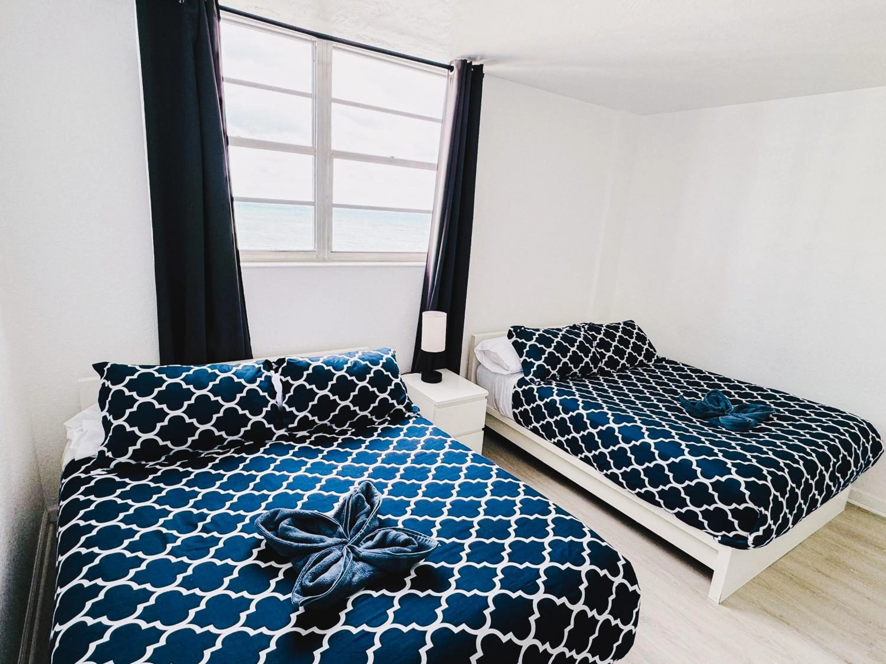 Bed in Miami Hallandale Condo, Partial Ocean View Direct Beach and Pool Access Miami Hollywood Beach