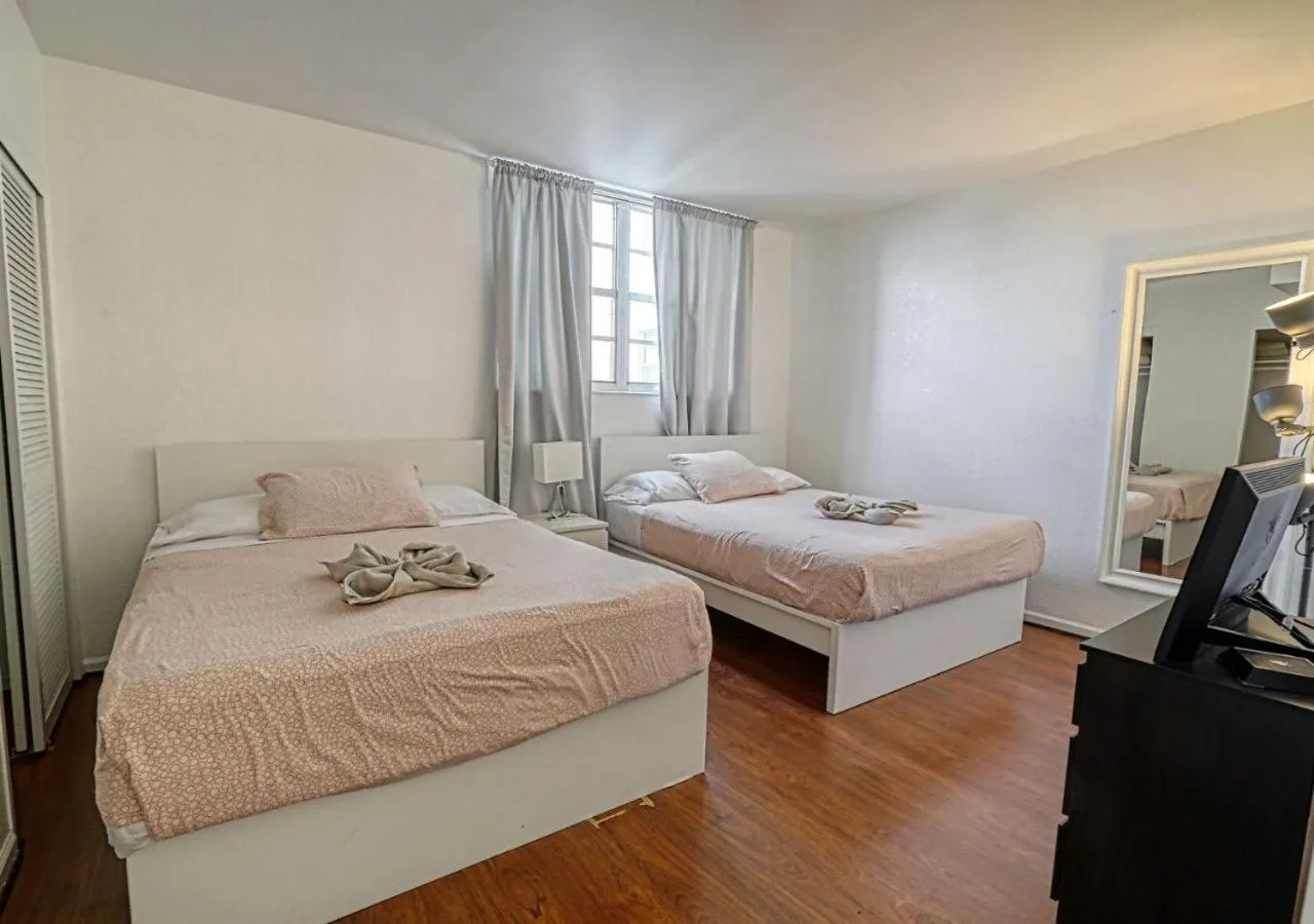 Bed in Miami Hallandale Condo, Partial Ocean View Direct Beach and Pool Access Miami Hollywood Beach