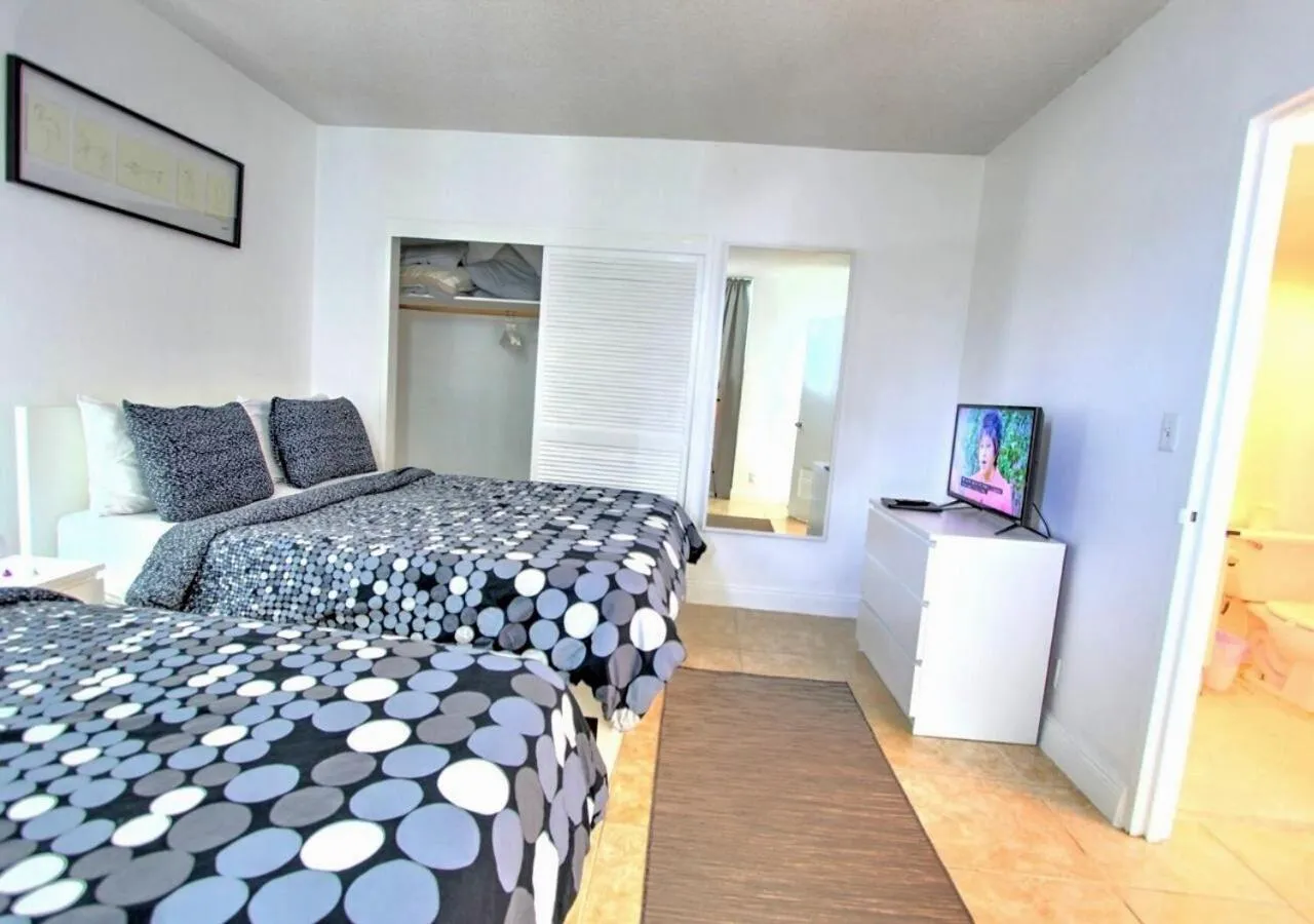 Bed in Miami Hallandale Condo, Partial Ocean View Direct Beach and Pool Access Miami Hollywood Beach