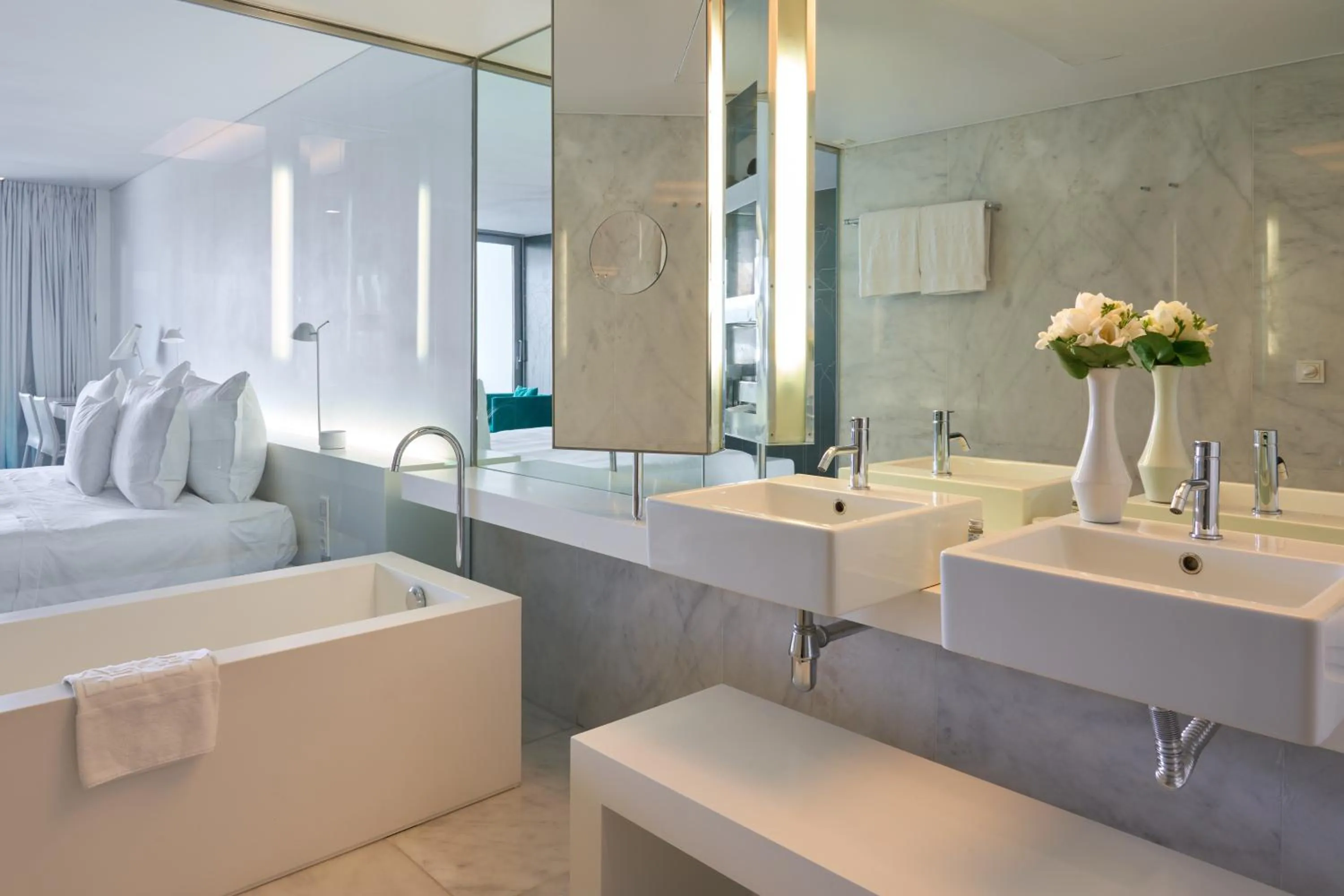 Bathroom, Bed in Altis Belem Hotel & Spa, a Member of Design Hotels