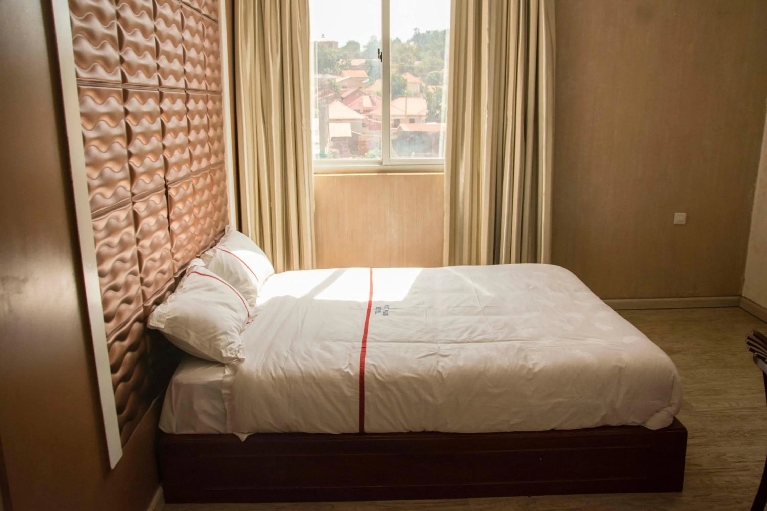 Bed in Freedom City Hotel Najjanankumbi Kamapala