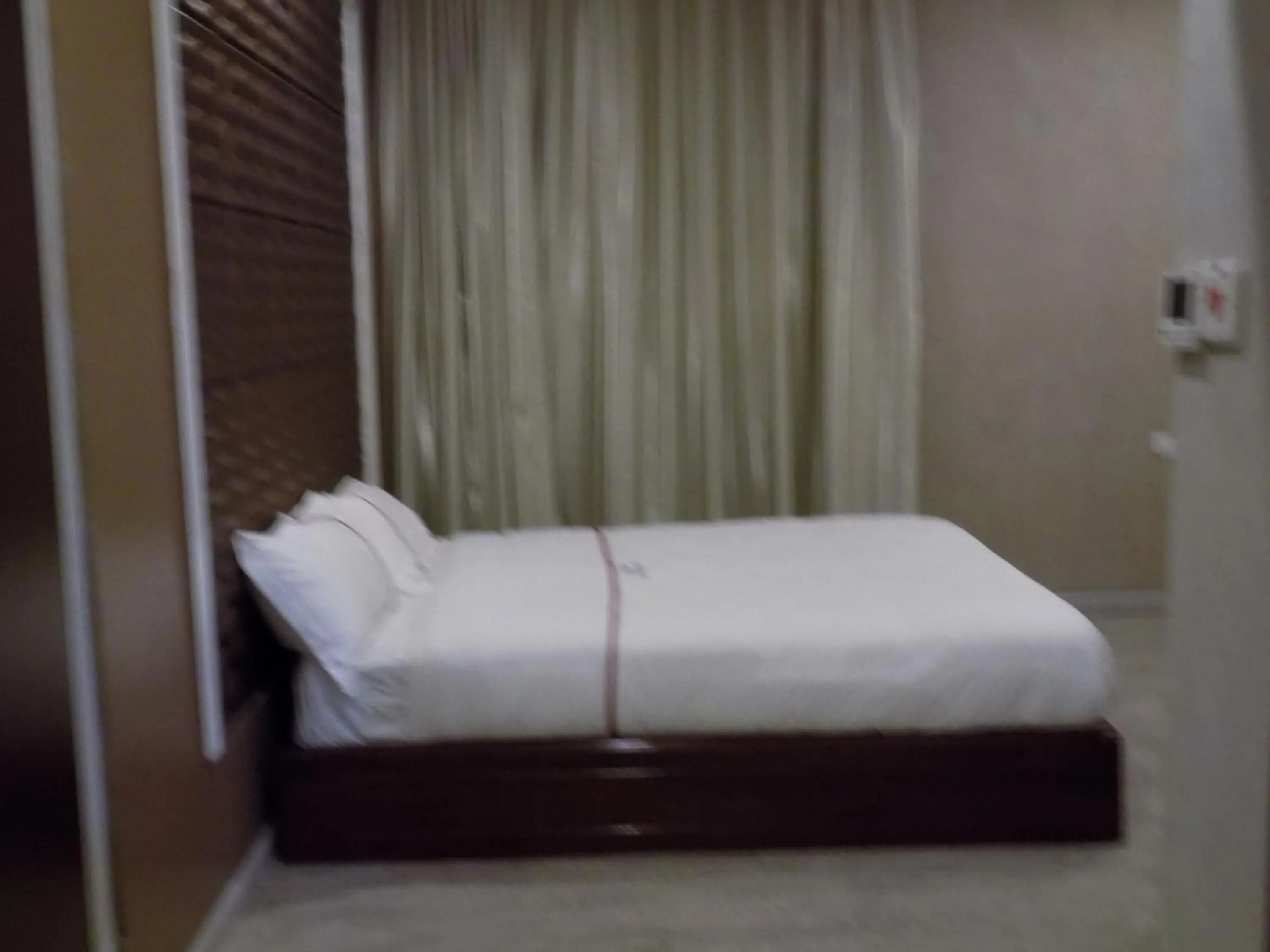 Bedroom in Freedom City Hotel Najjanankumbi Kamapala