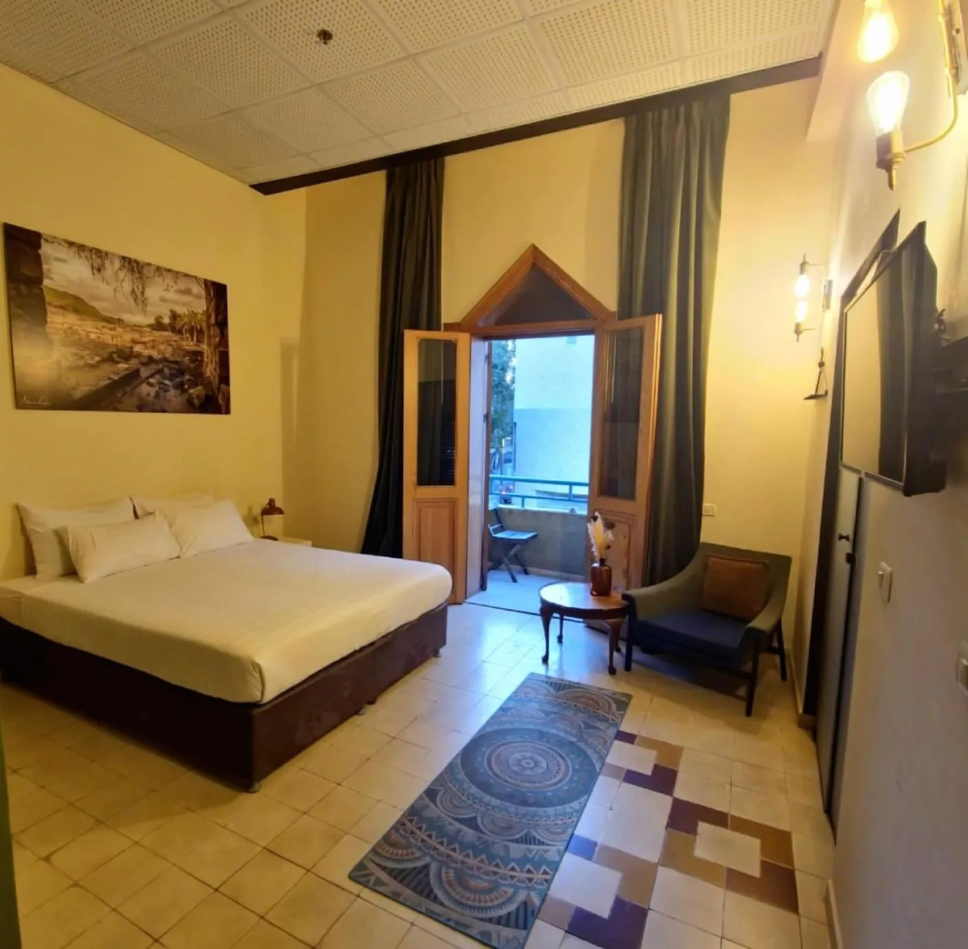 Living room, Bed in INTA Hotel