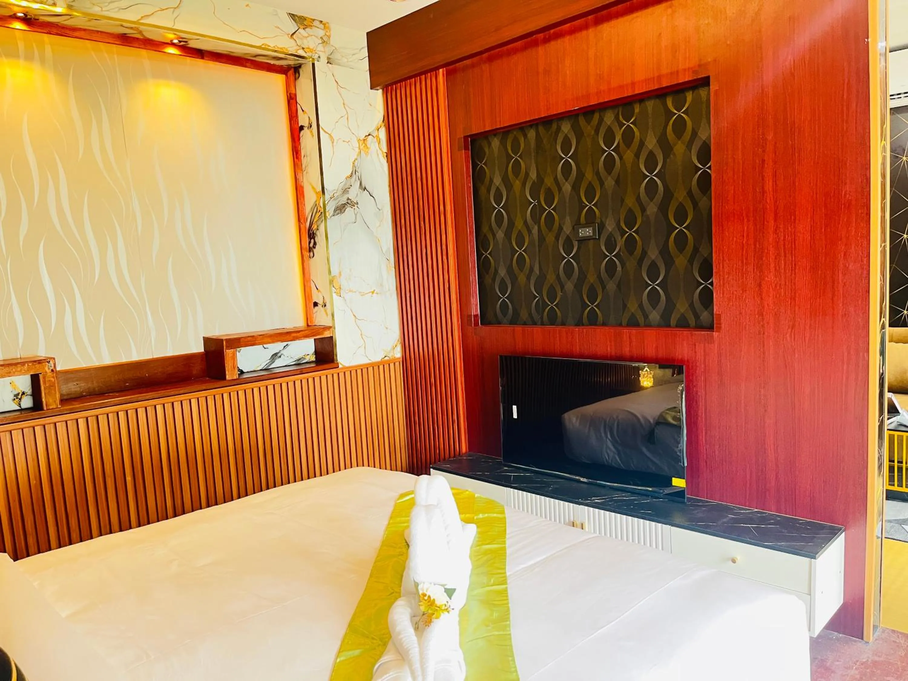 Bed in New Ozone Resort & Spa